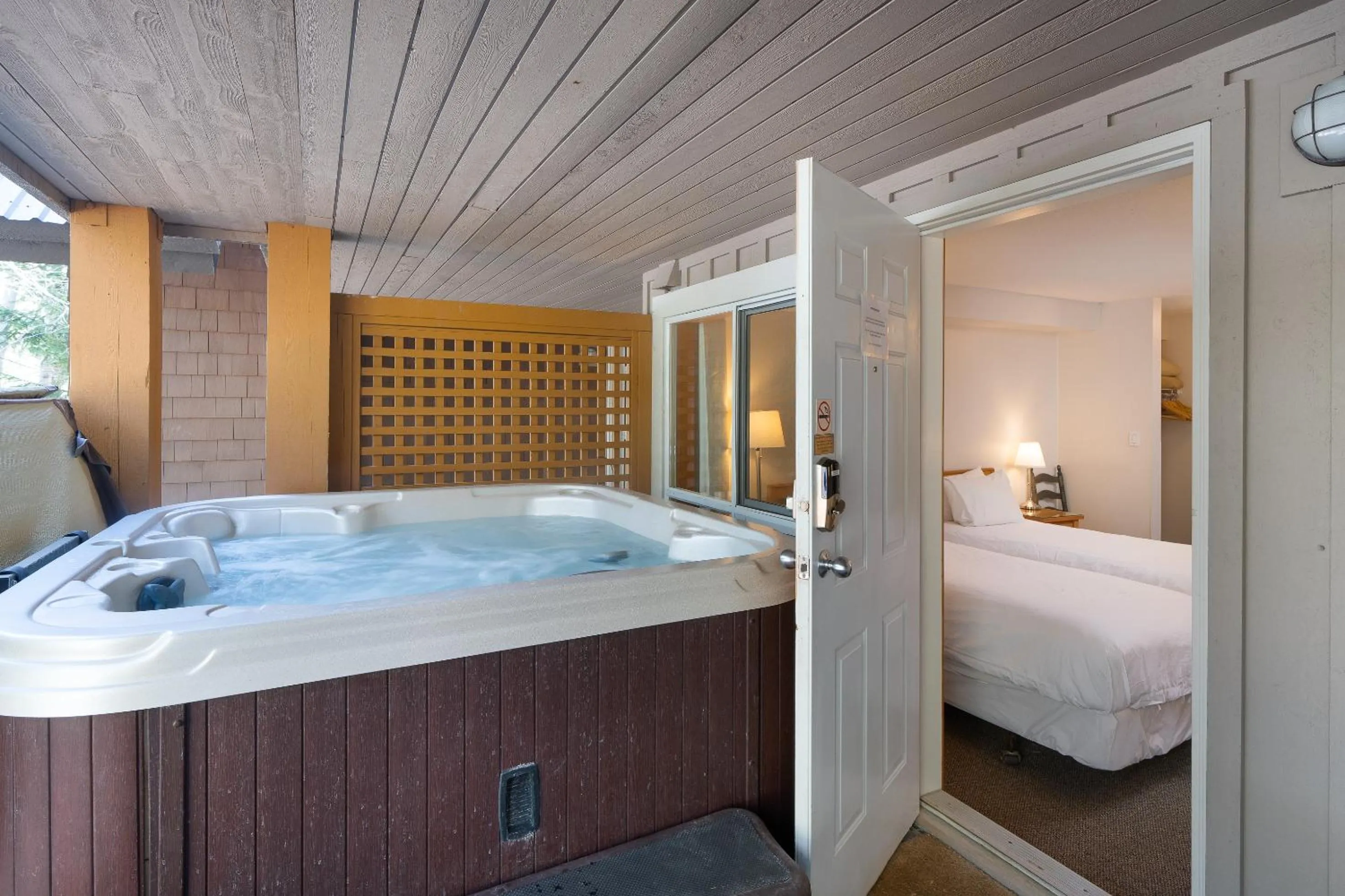 Hot Tub, Bed in Glaciers Reach by Allseason Vacation Rentals