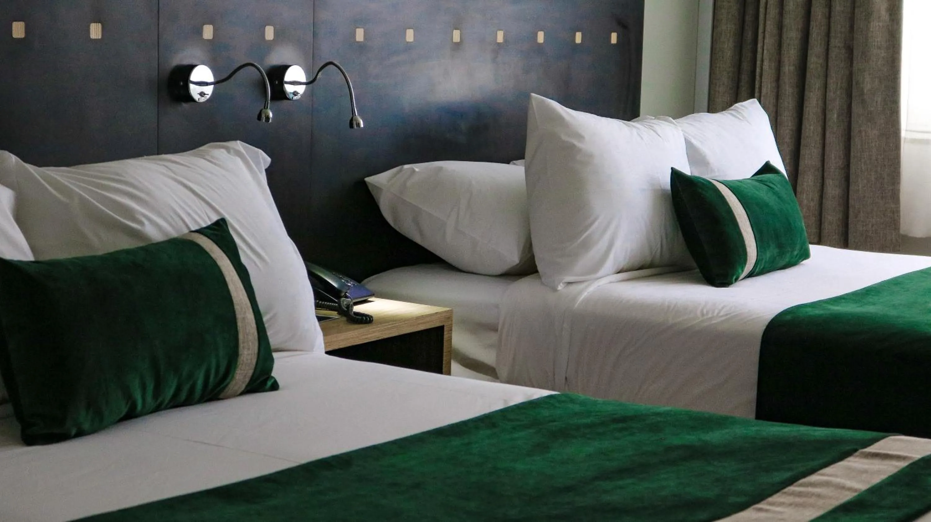 Bed in Ecohotel Talca