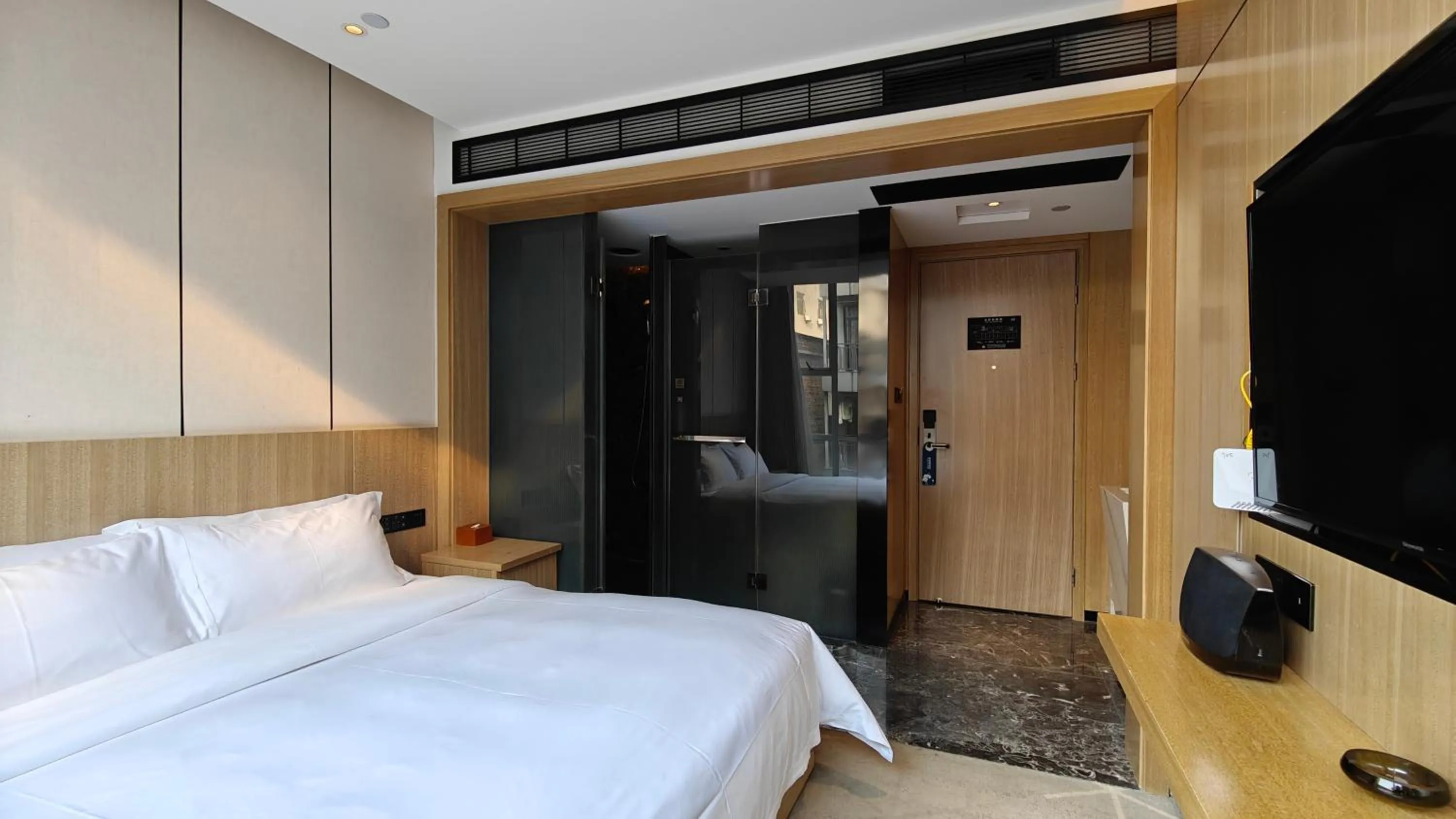 Photo of the whole room, Bed in Paco Hotel Guangzhou Baiyun Airport Liantang Metro