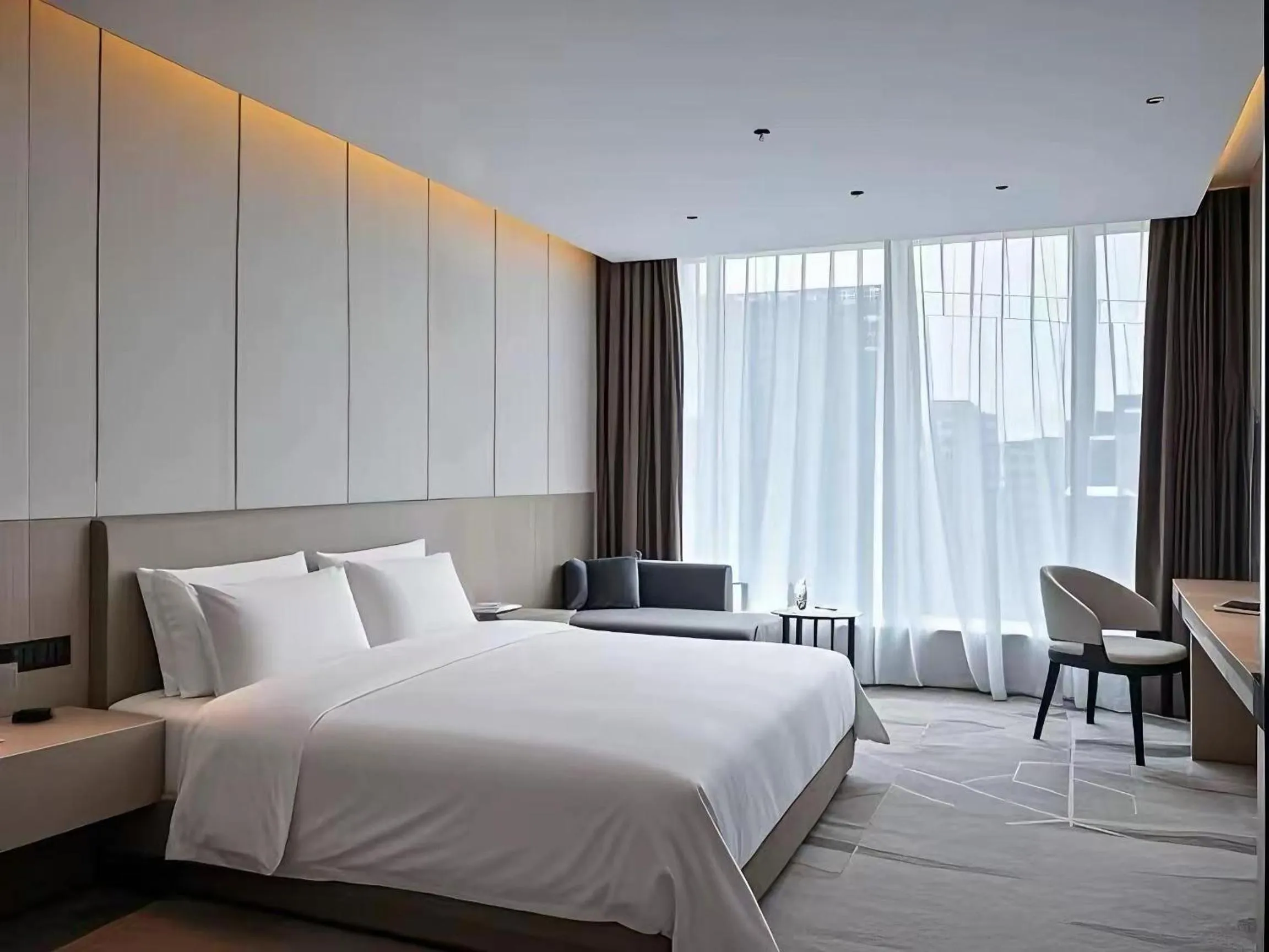 Photo of the whole room, Bed in Paco Hotel Guangzhou Baiyun Airport Liantang Metro
