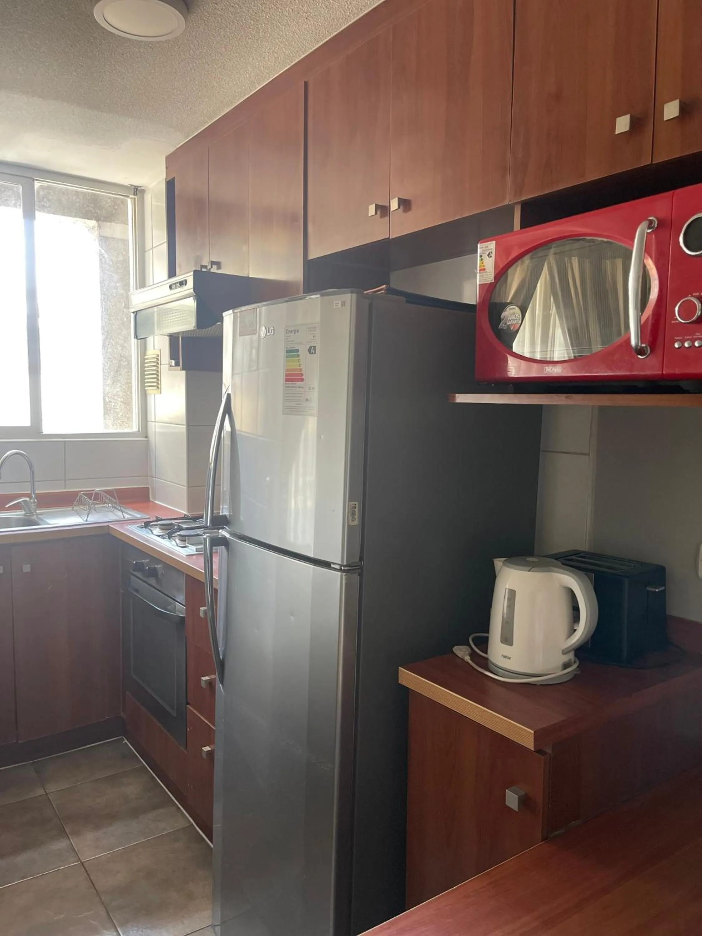 Kitchen or kitchenette in VR Suite Santiago
