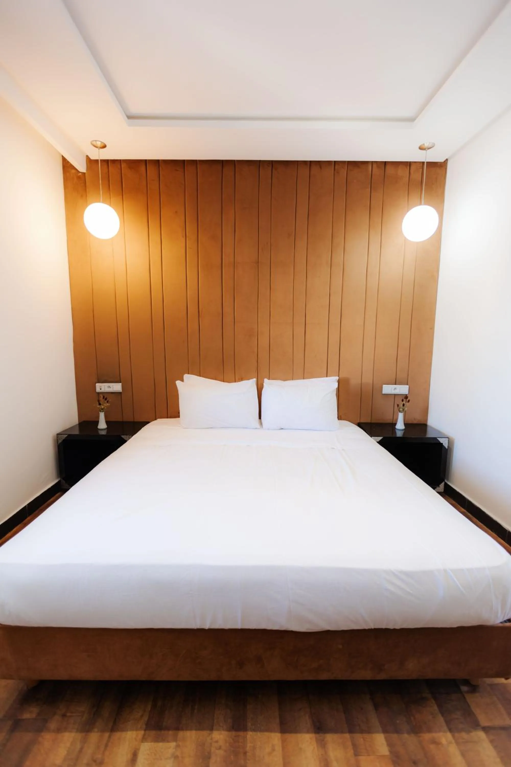 Bed in WINDSOR HOTEL CITY CENTER