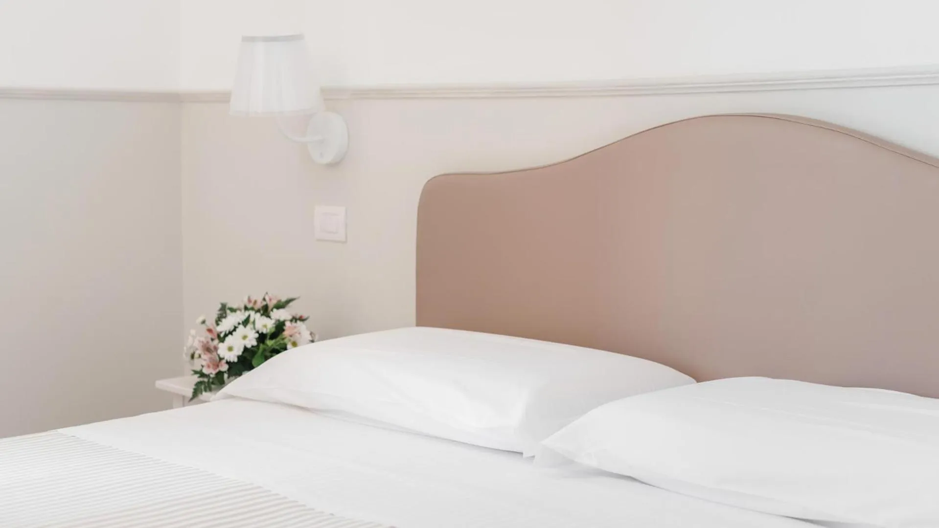 Bed in Miramare Hotel