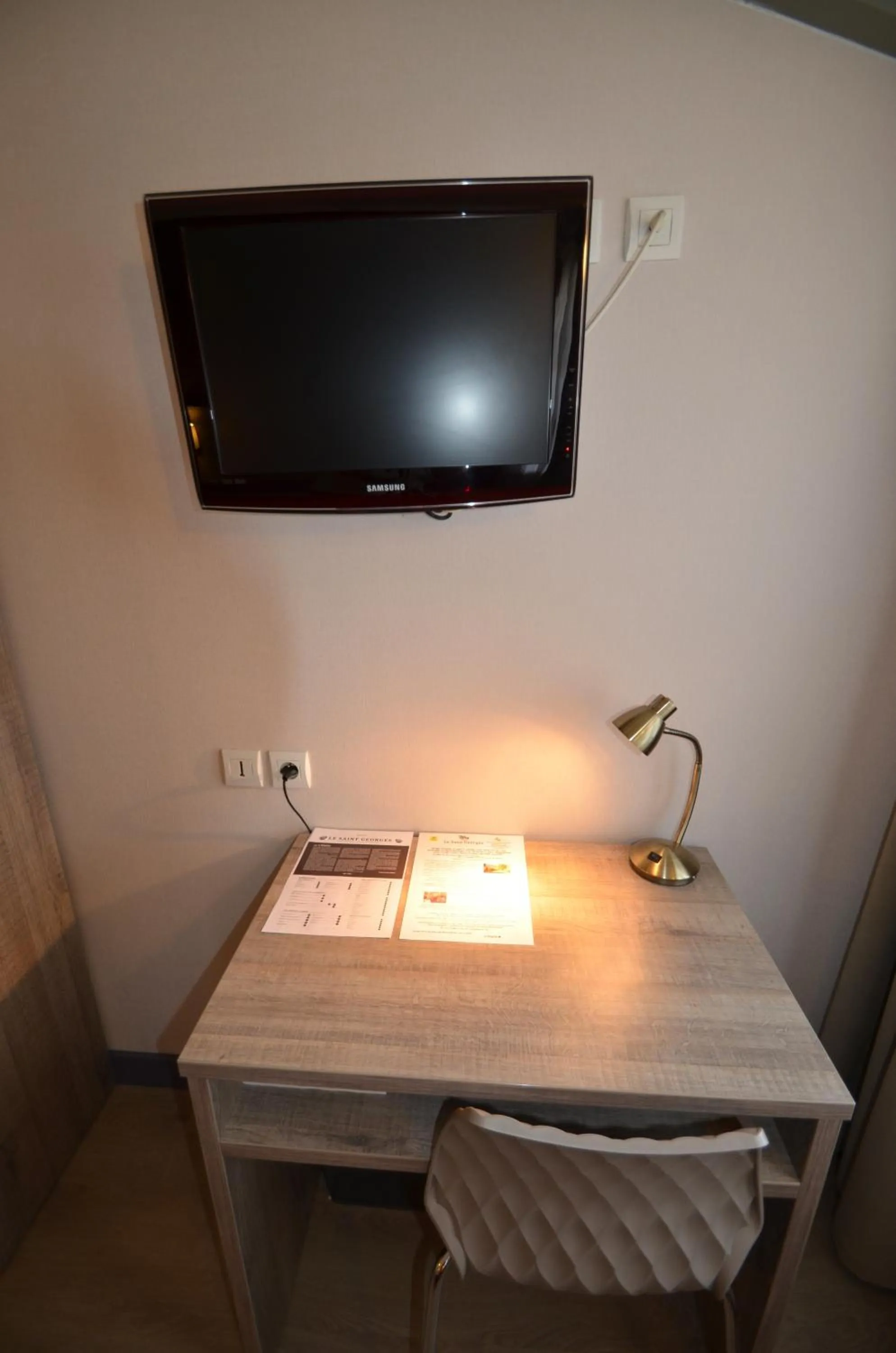 Bedroom in Logis Hôtel Le Saint Georges