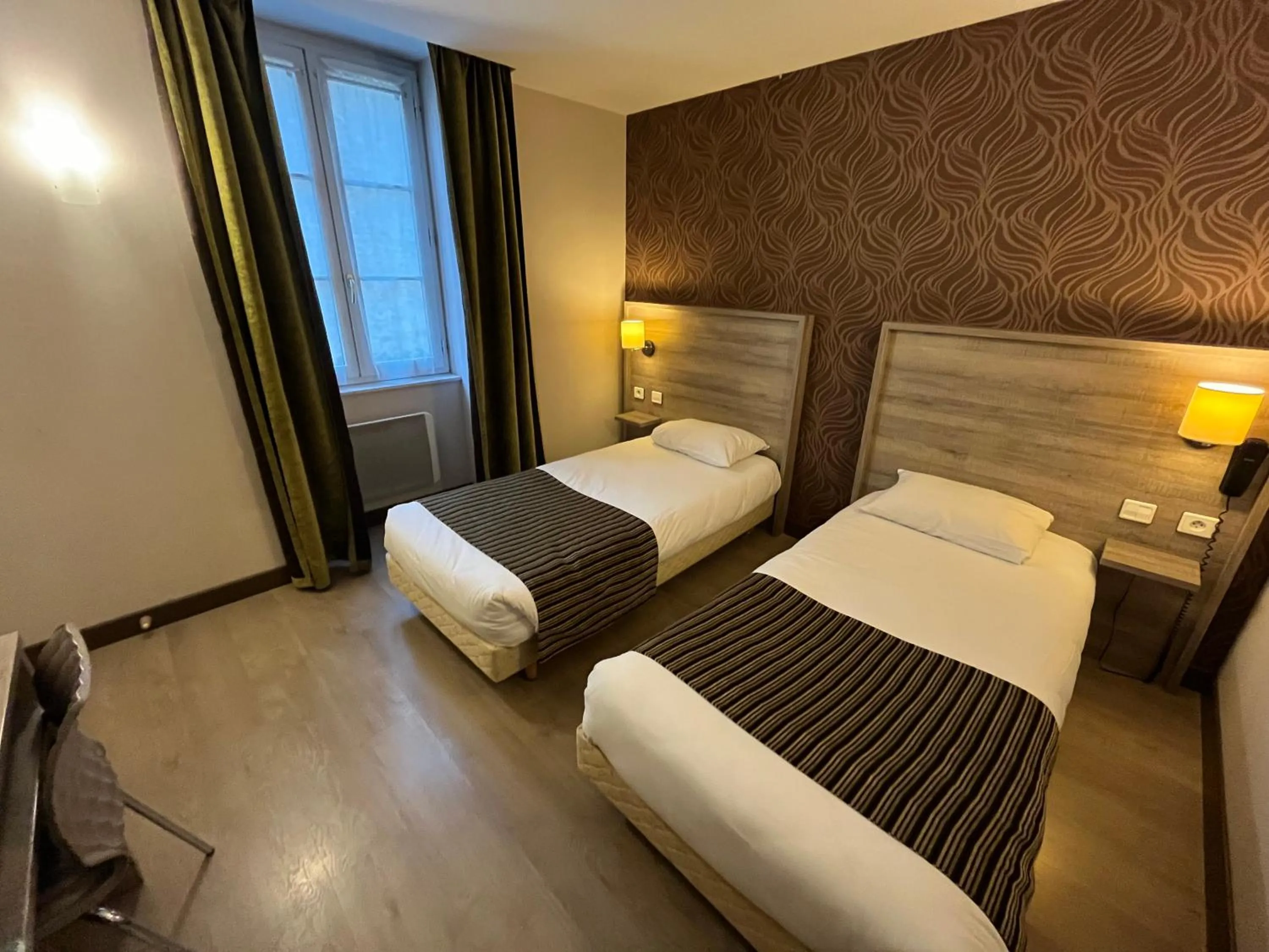 Photo of the whole room, Bed in Logis Hôtel Le Saint Georges