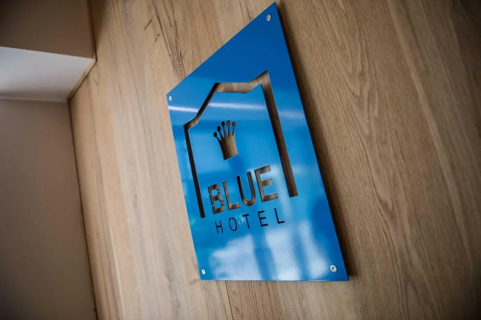 Property logo or sign in Blue Hotel