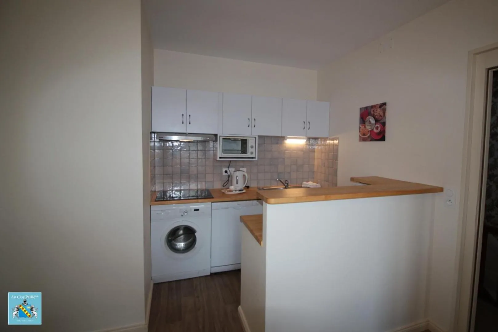 Kitchen or kitchenette in Hôtel Au Clos Paillé La Roche Posay