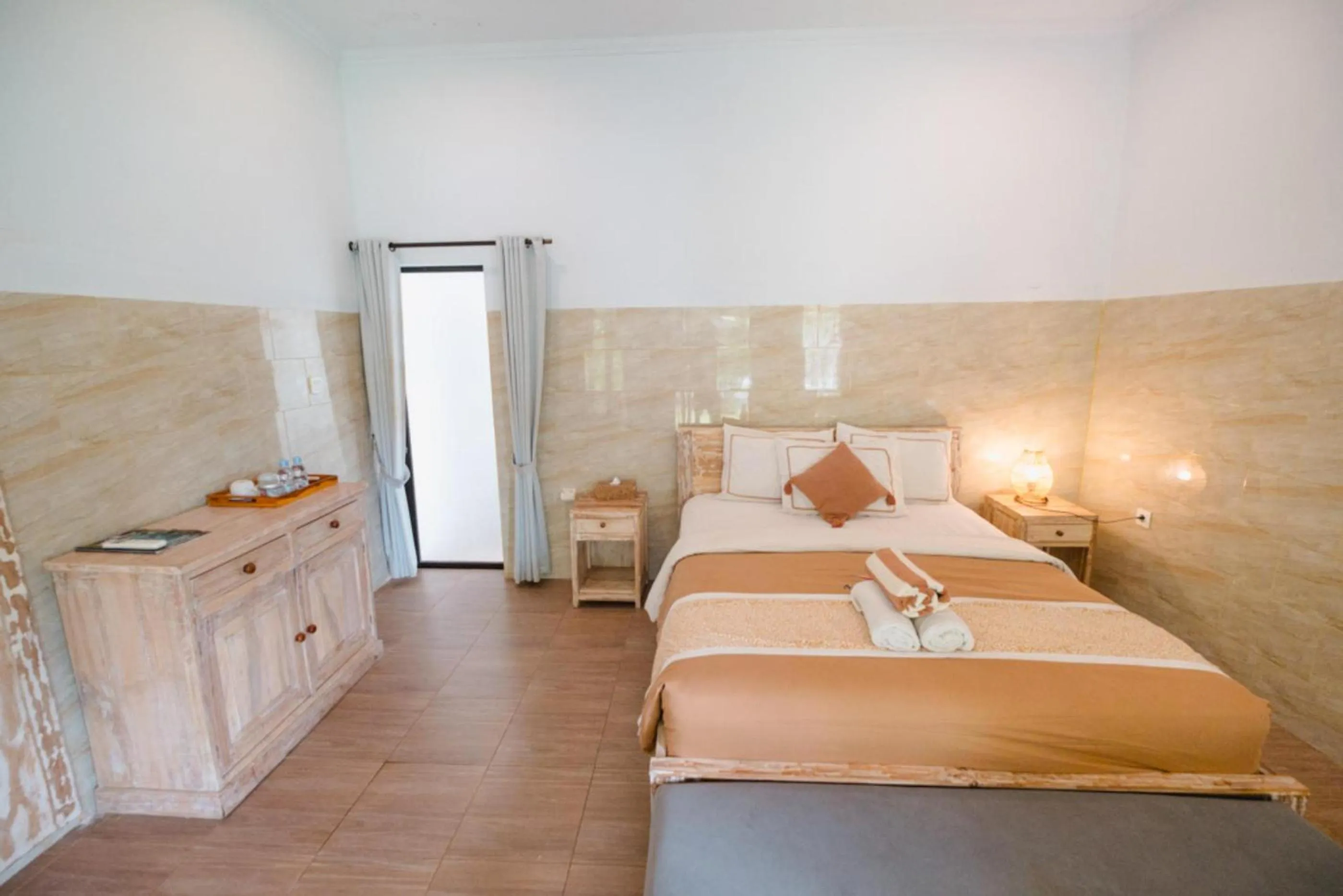 Bed in Agung Wiwin Homestay & Restaurant