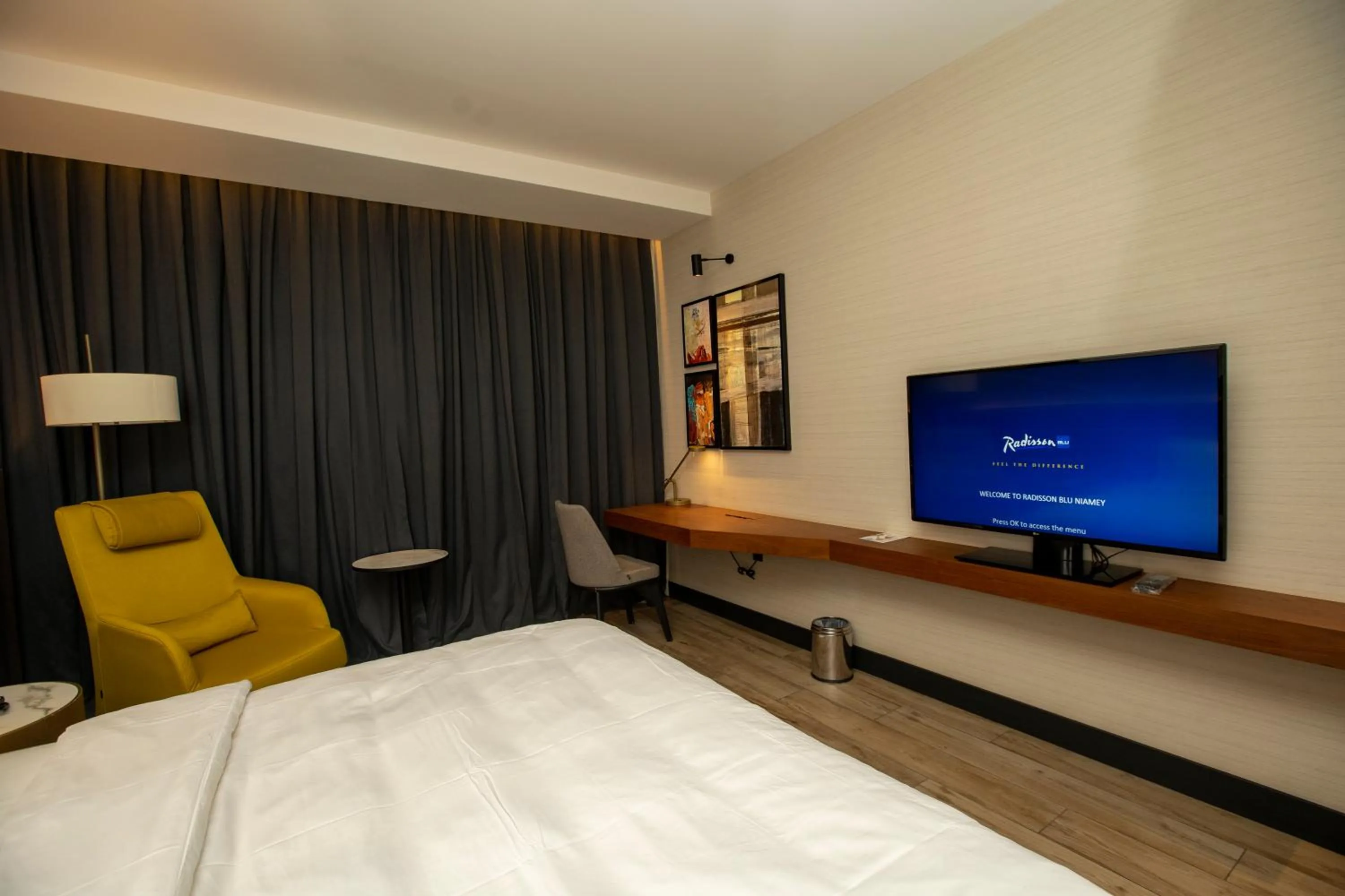 Photo of the whole room, Bed in Radisson Blu Hotel & Conference Center, Niamey