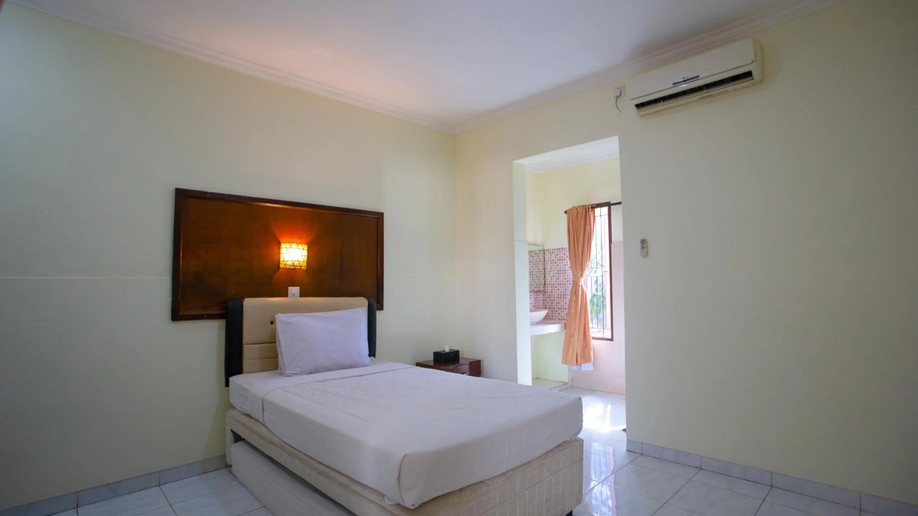 Bed in Teges Inn Kuta