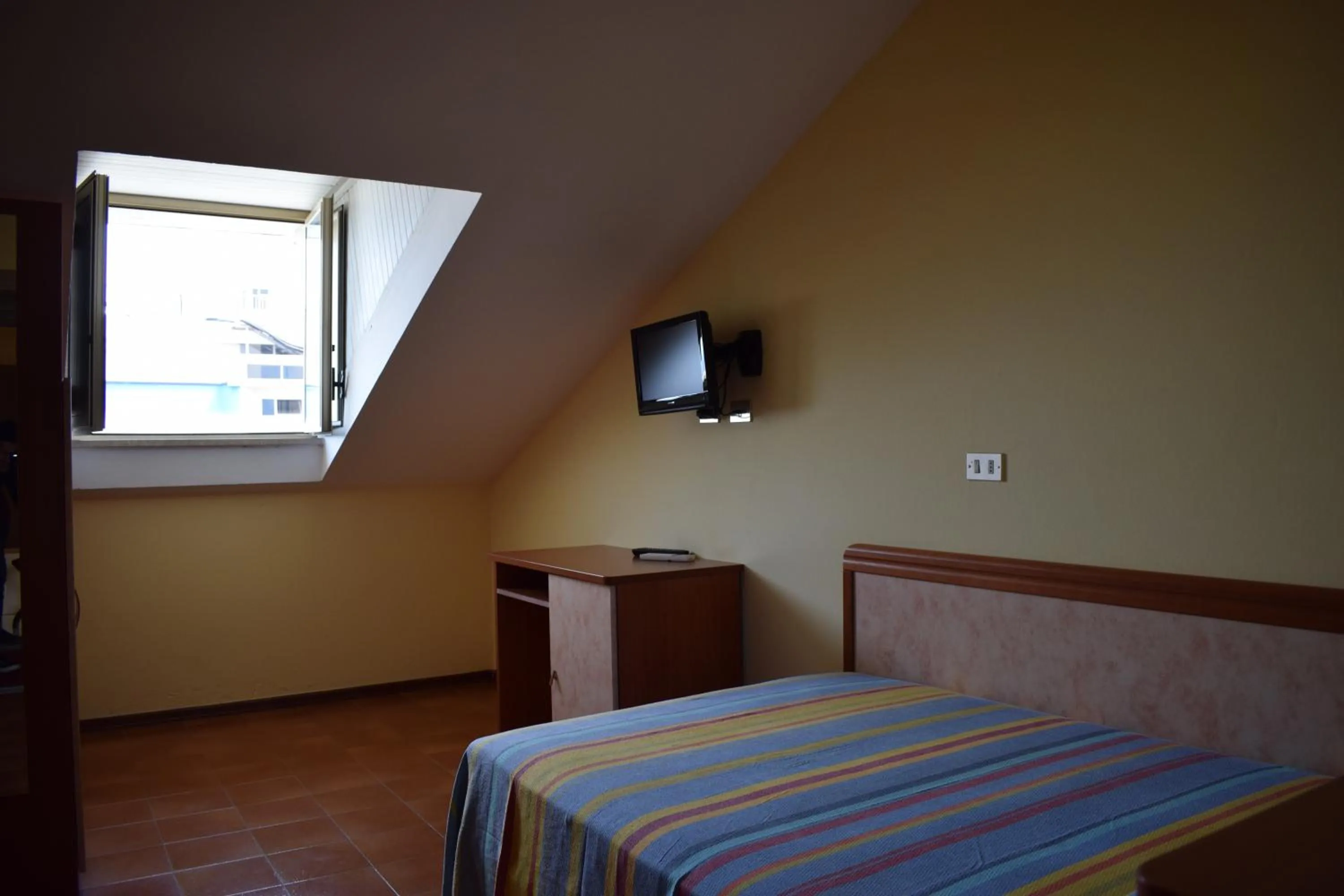 Bed in Hotel Martinez