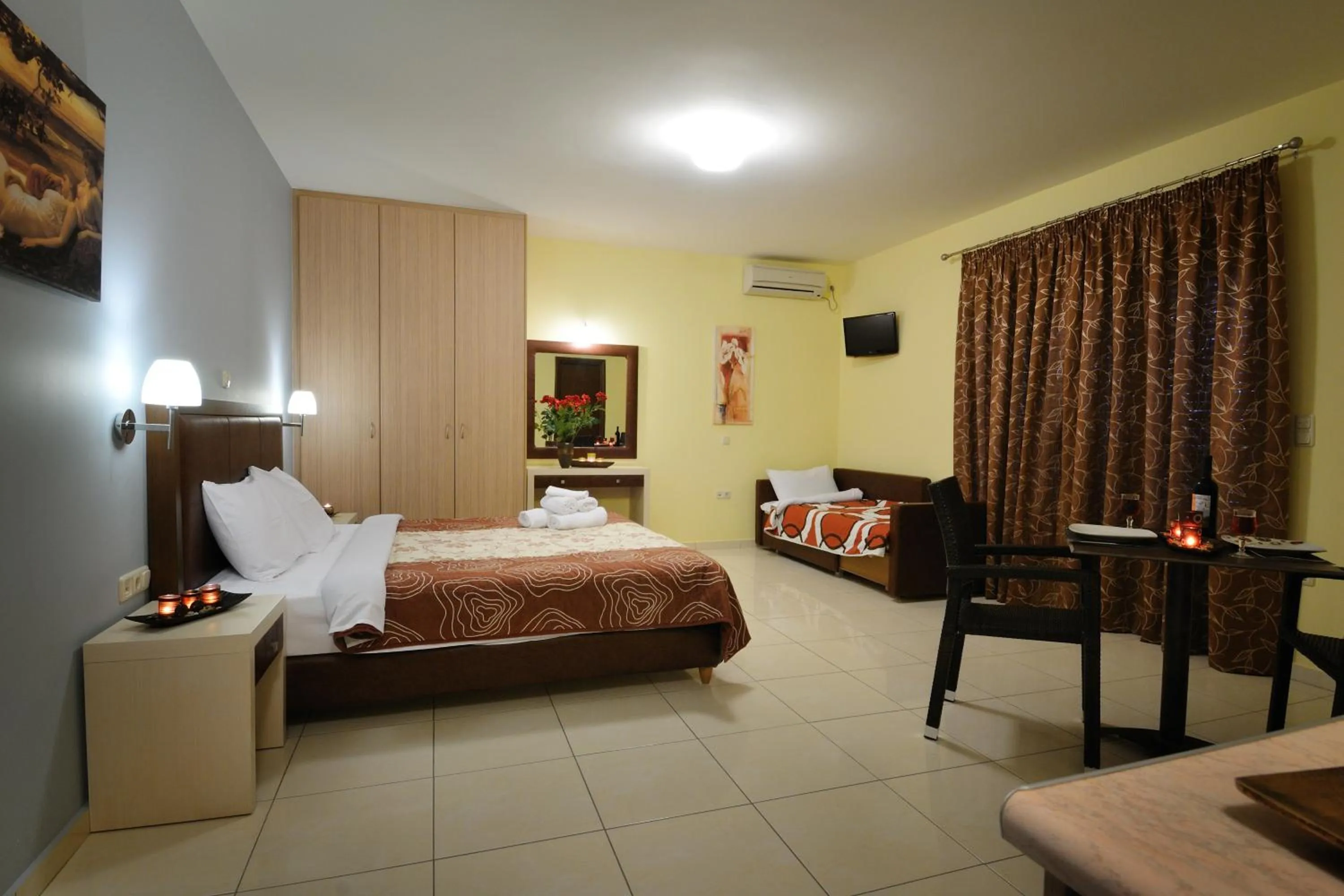 Bed in Faros Luxury Suites