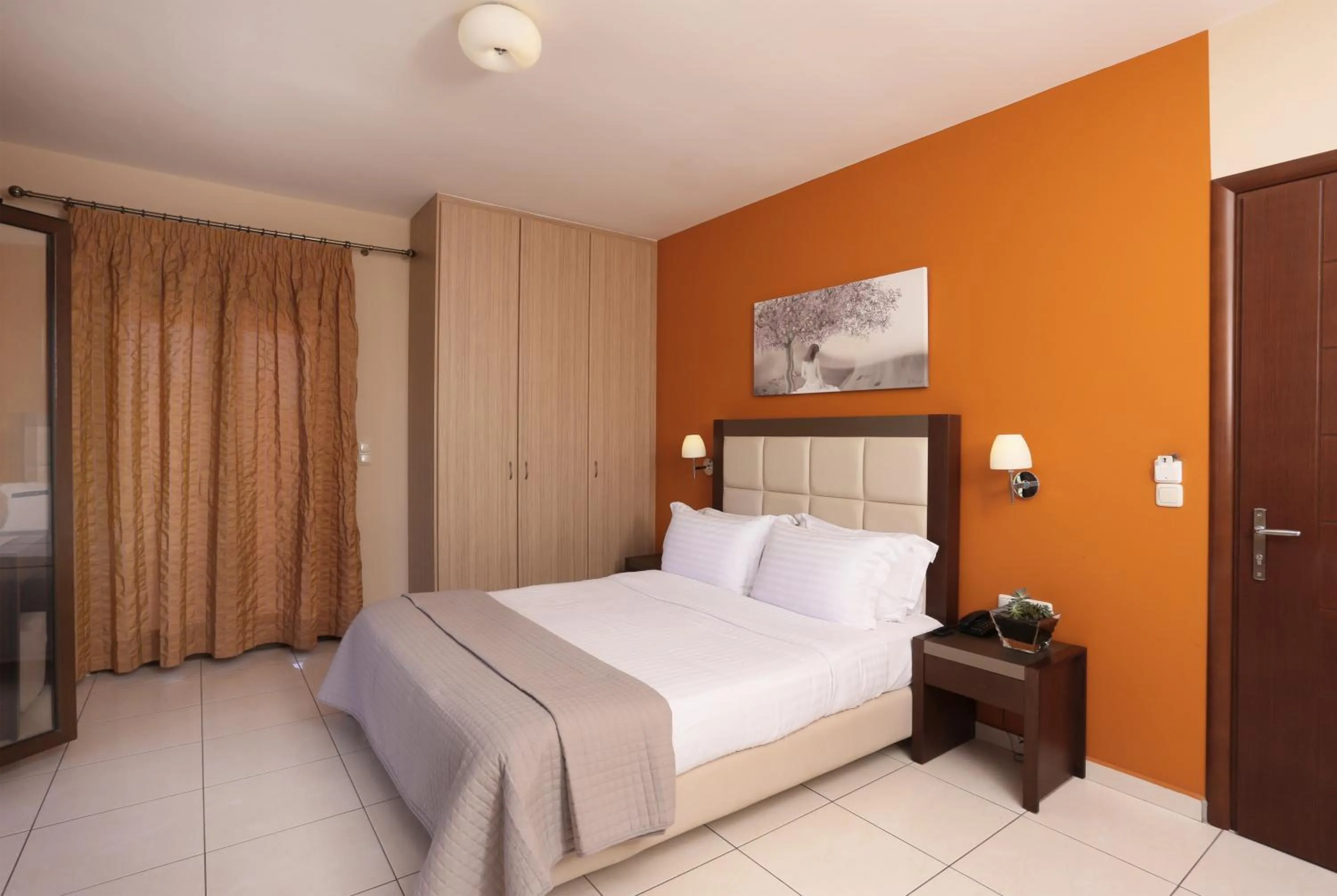 Bed in Faros Luxury Suites