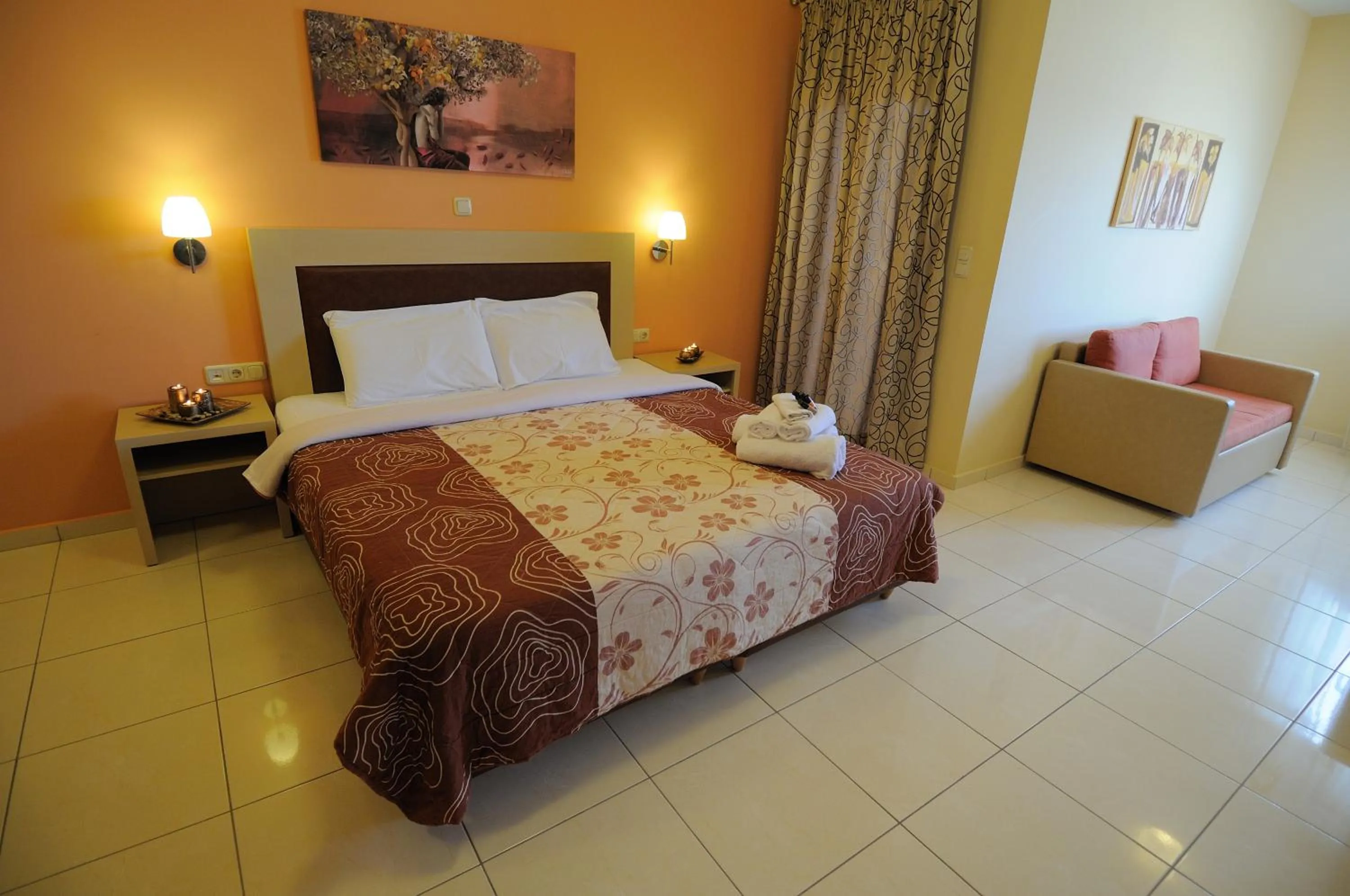 Bed in Faros Luxury Suites