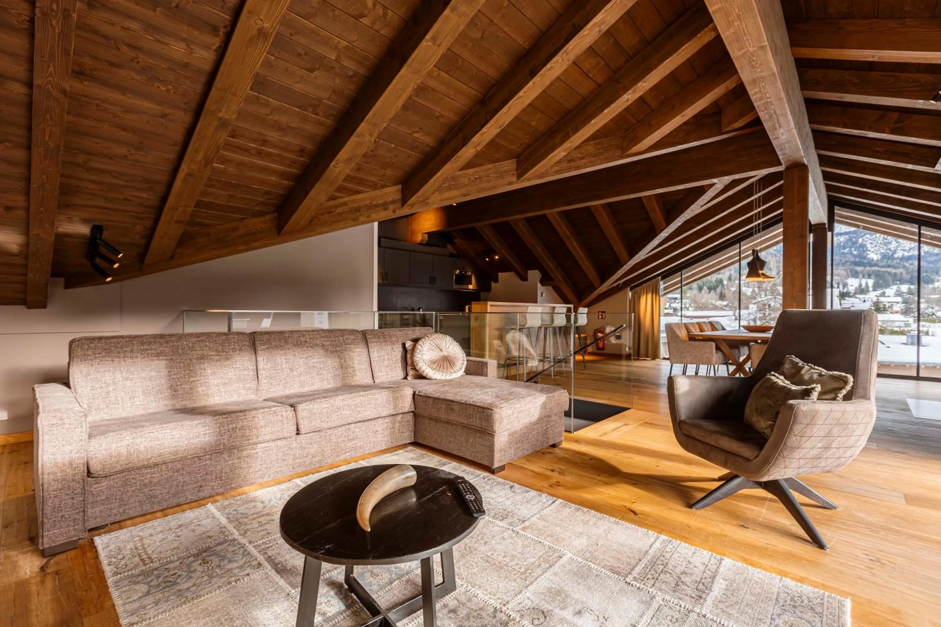 Living room in Bergresort Zugspitze Ehrwald by ALPS RESORTS