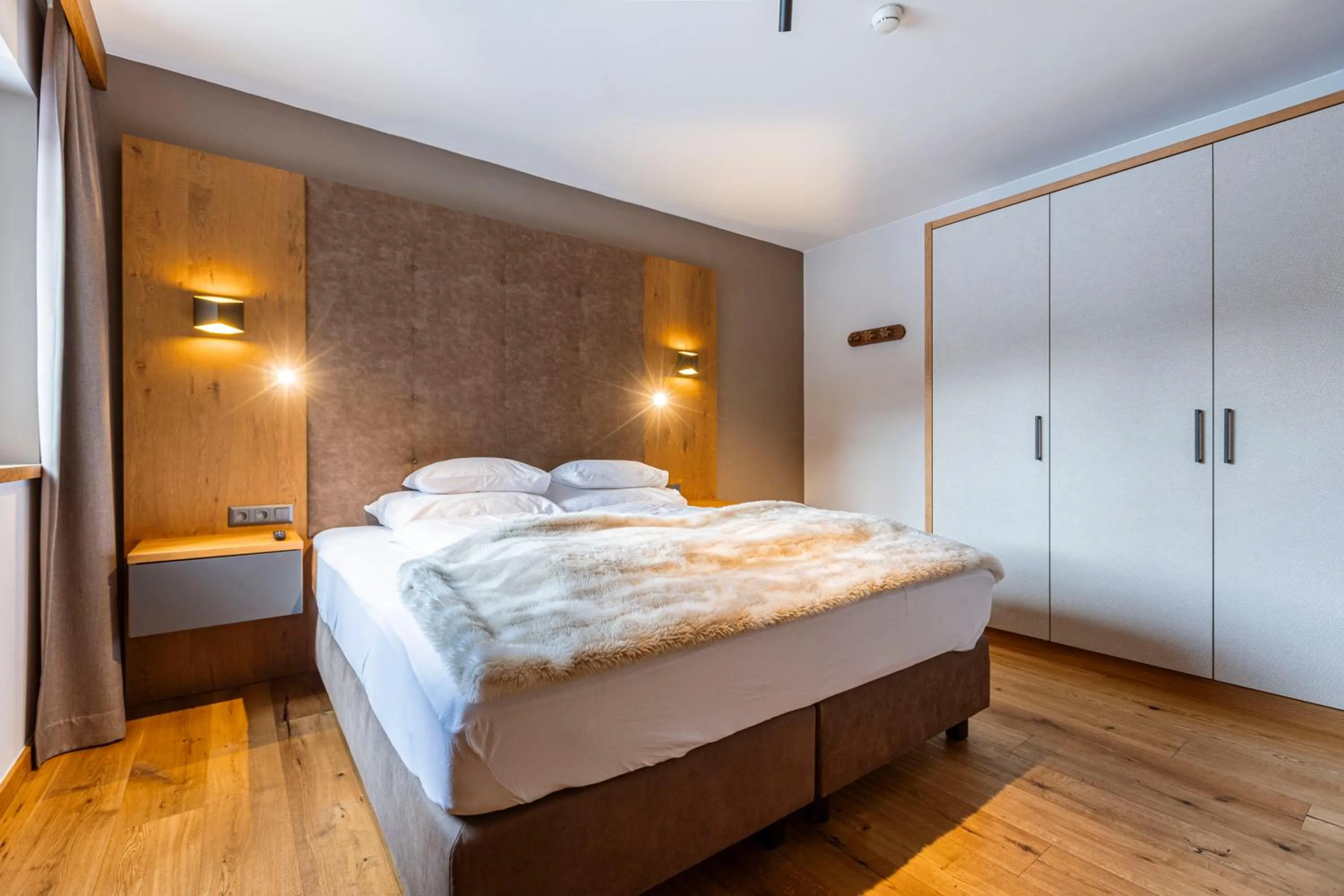 Bedroom, Bed in Bergresort Zugspitze Ehrwald by ALPS RESORTS