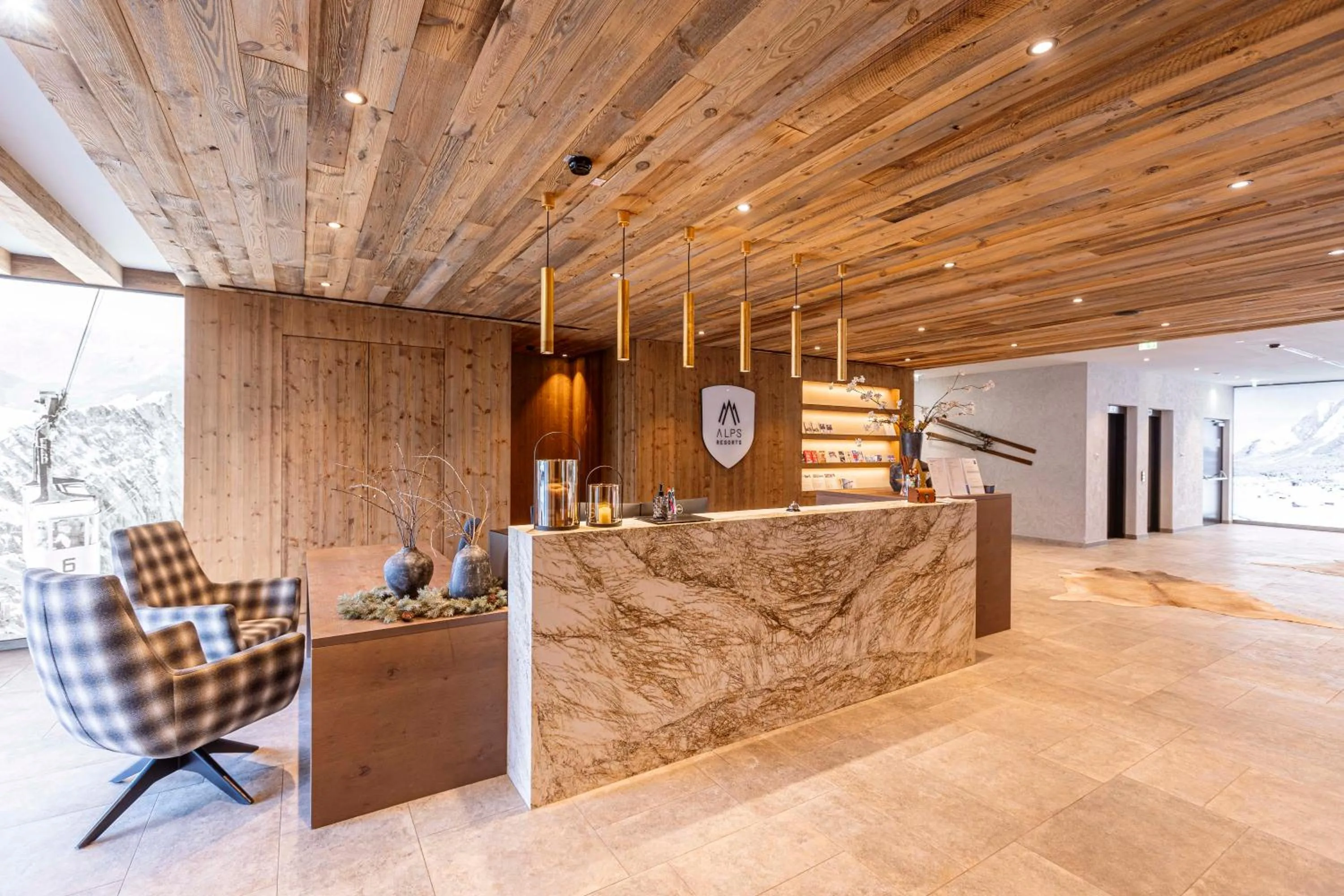 Lobby or reception in Bergresort Zugspitze Ehrwald by ALPS RESORTS