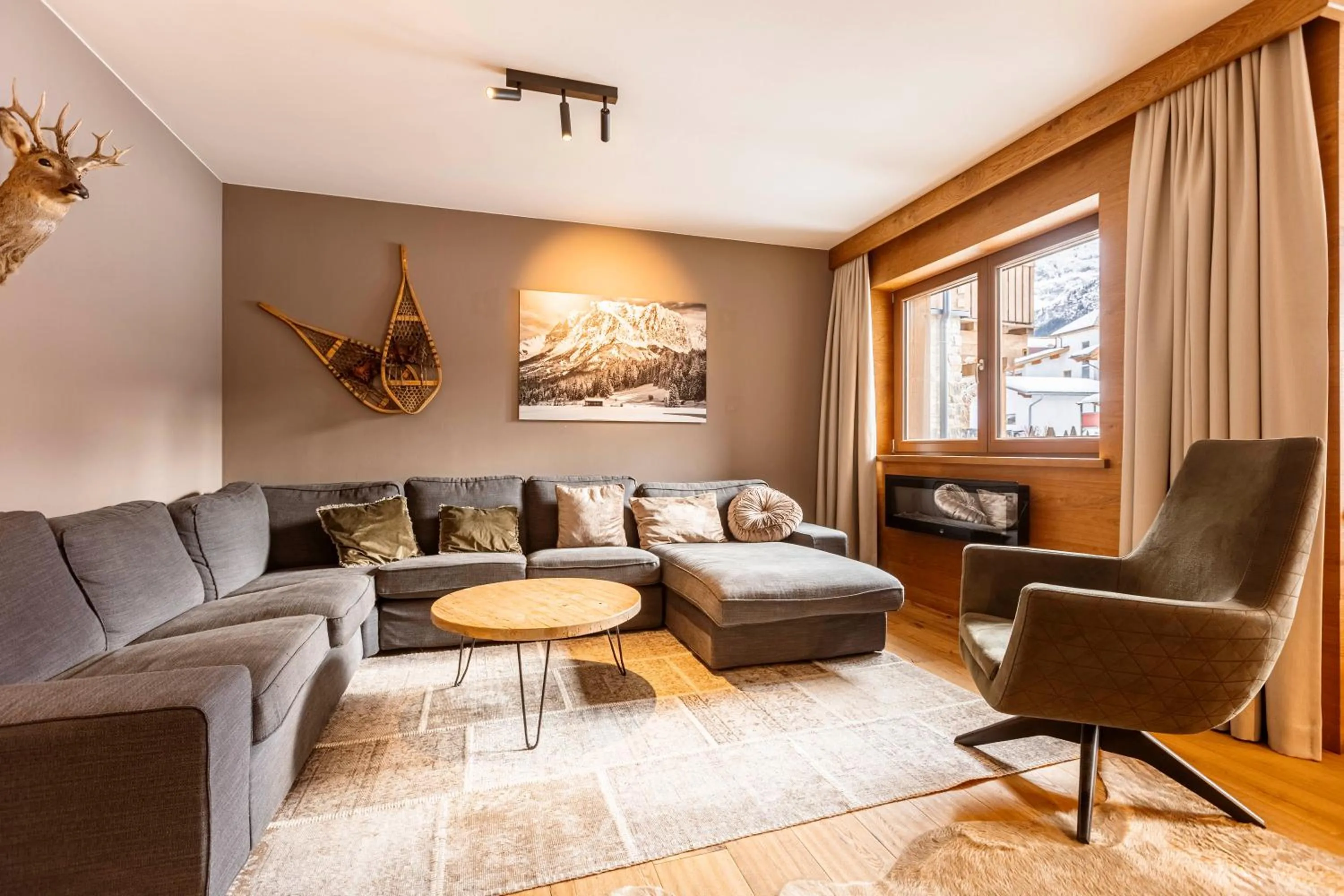Living room in Bergresort Zugspitze Ehrwald by ALPS RESORTS