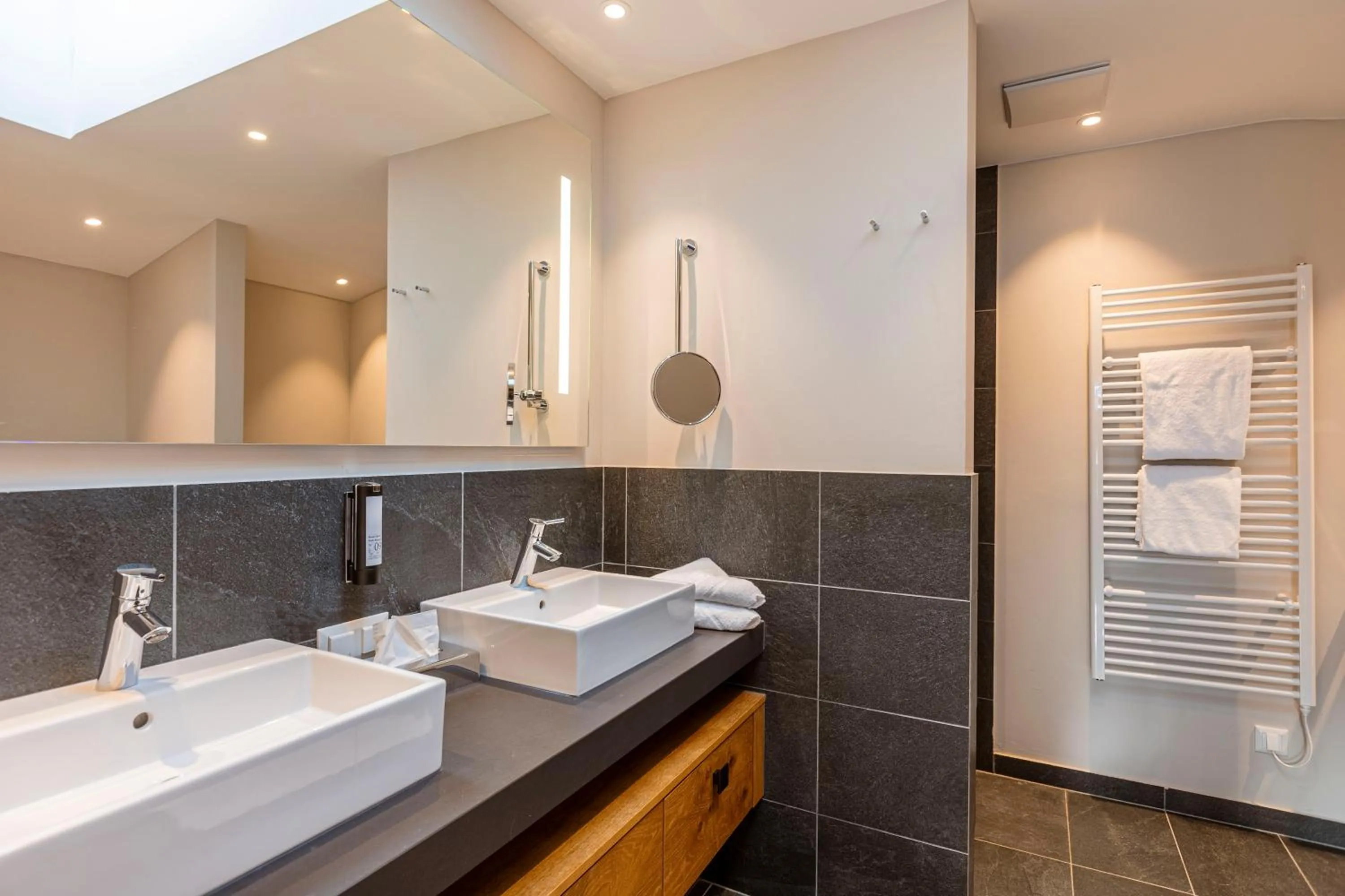 Bathroom in Bergresort Zugspitze Ehrwald by ALPS RESORTS