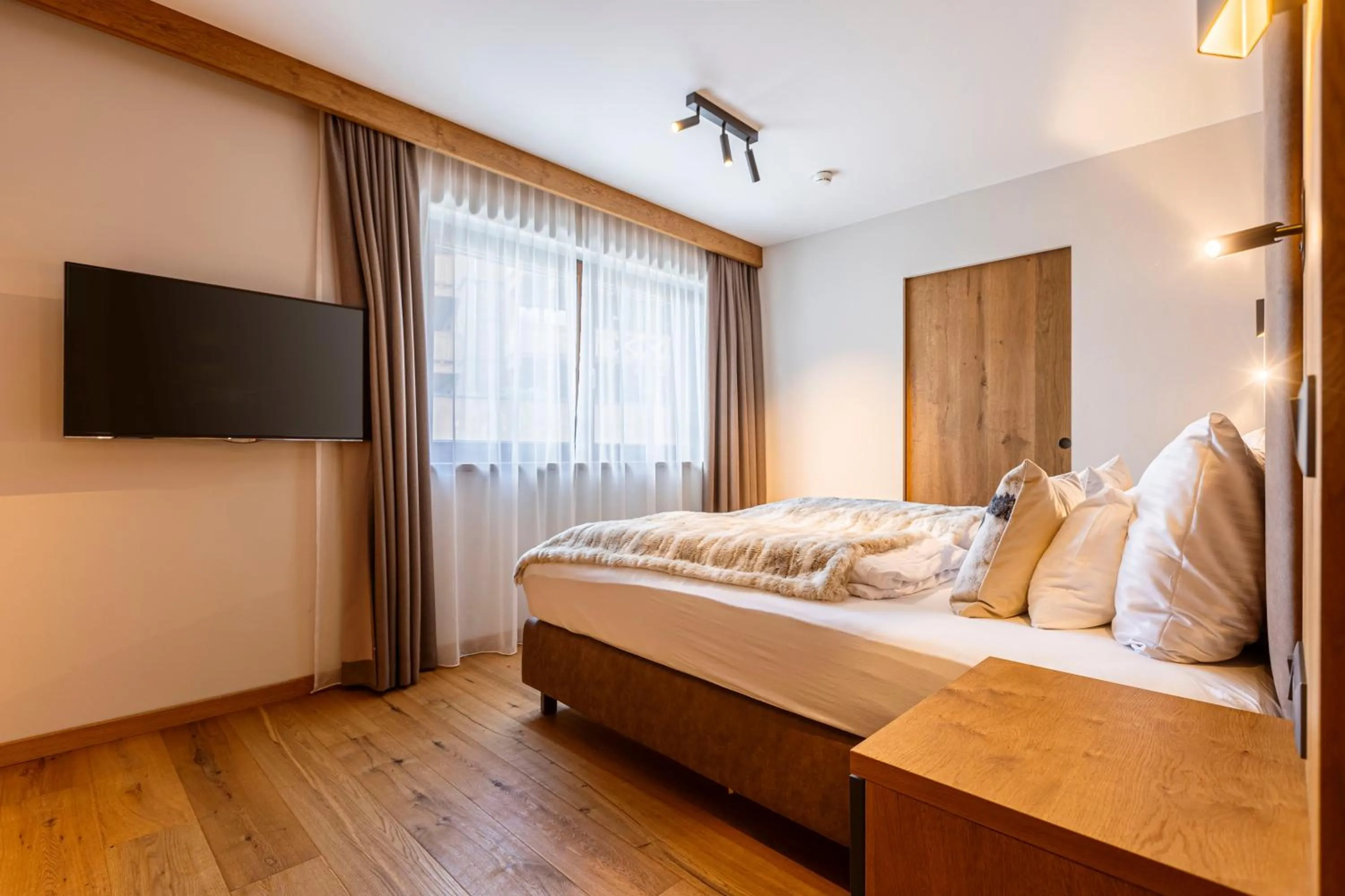 Bedroom, Bed in Bergresort Zugspitze Ehrwald by ALPS RESORTS