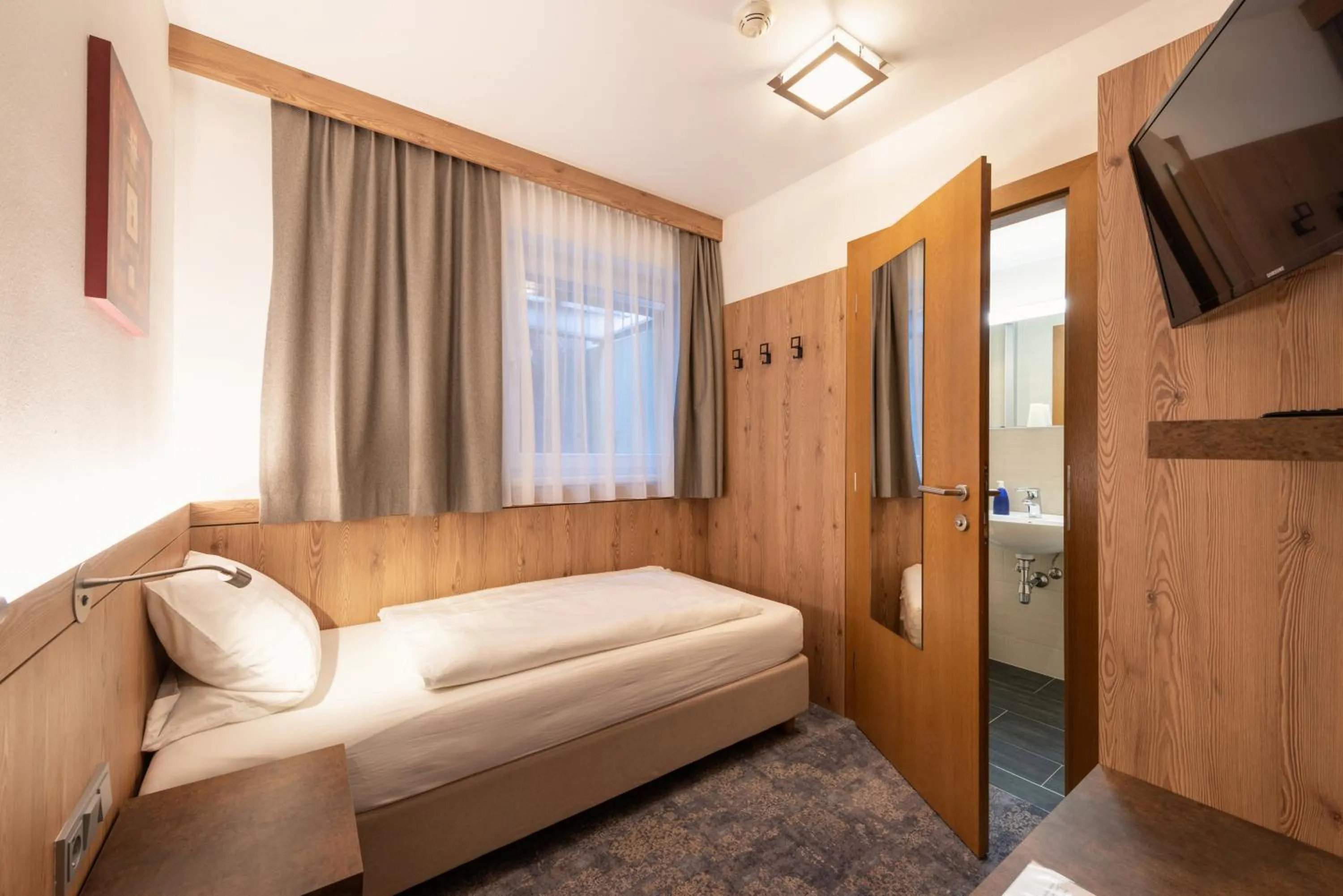 Photo of the whole room, Bed in Hotel Alpenland