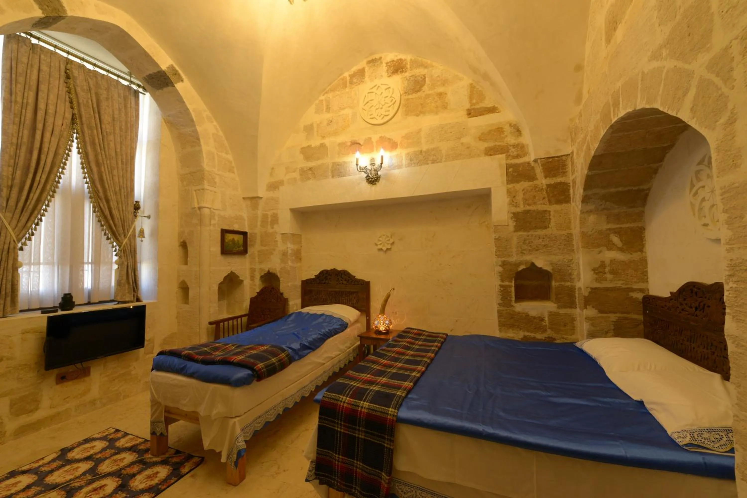 Bed in MERDİN BOUTİQUE HOTEL