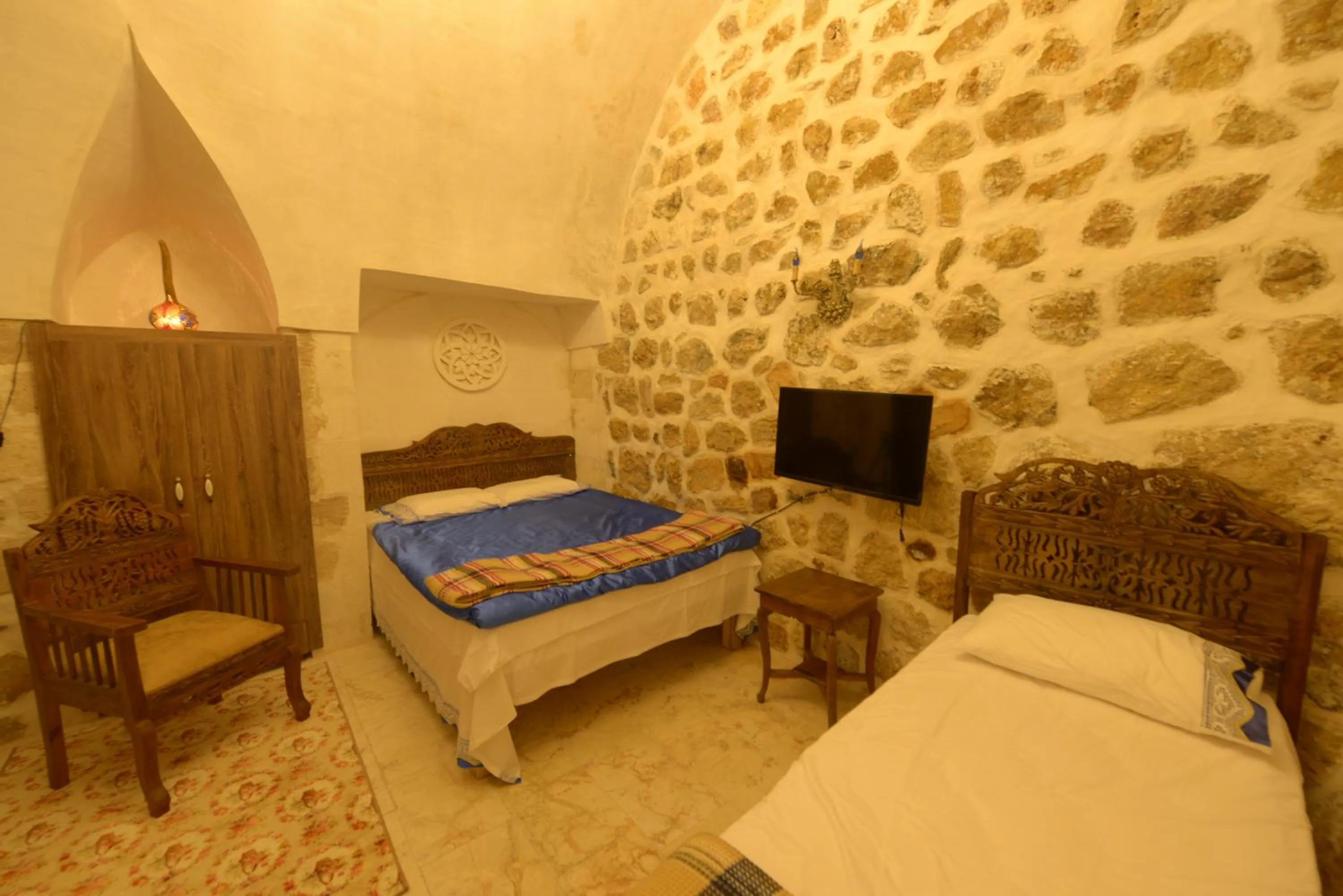 Bed in MERDİN BOUTİQUE HOTEL