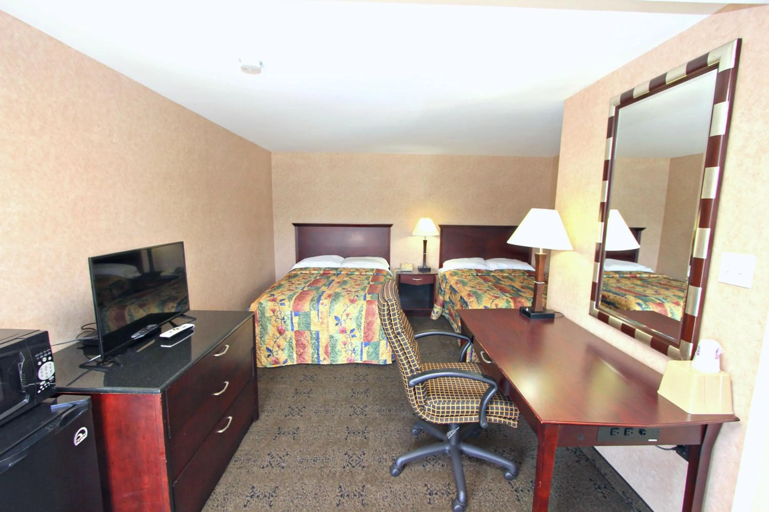 Bed in Knights Inn Pine Grove