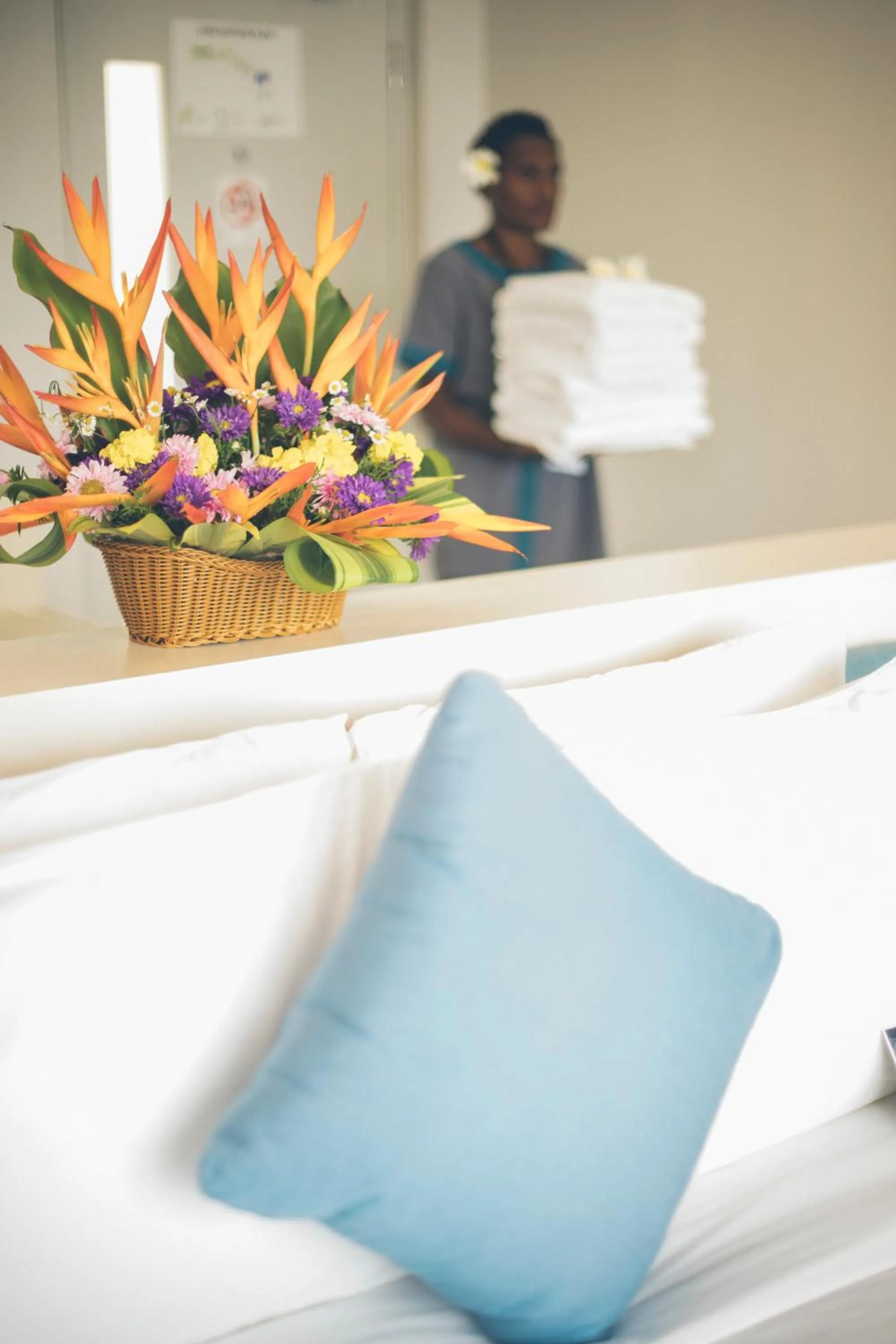 Bed in Loloata Island Resort