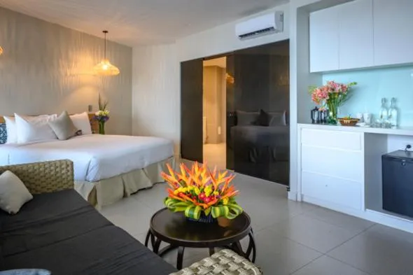 Property building, Bed in Loloata Island Resort