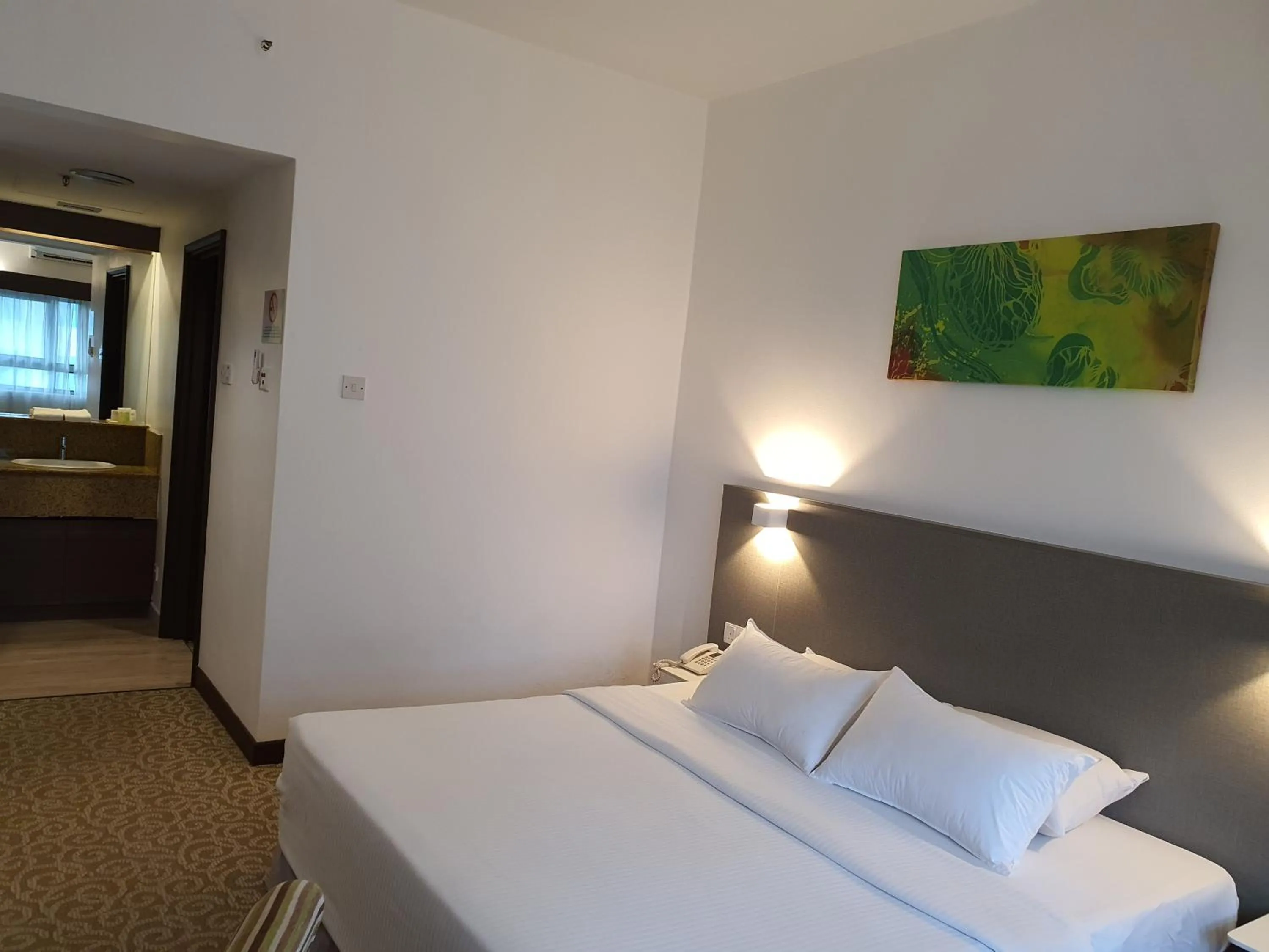 Bed in Crown Regency Serviced Suites