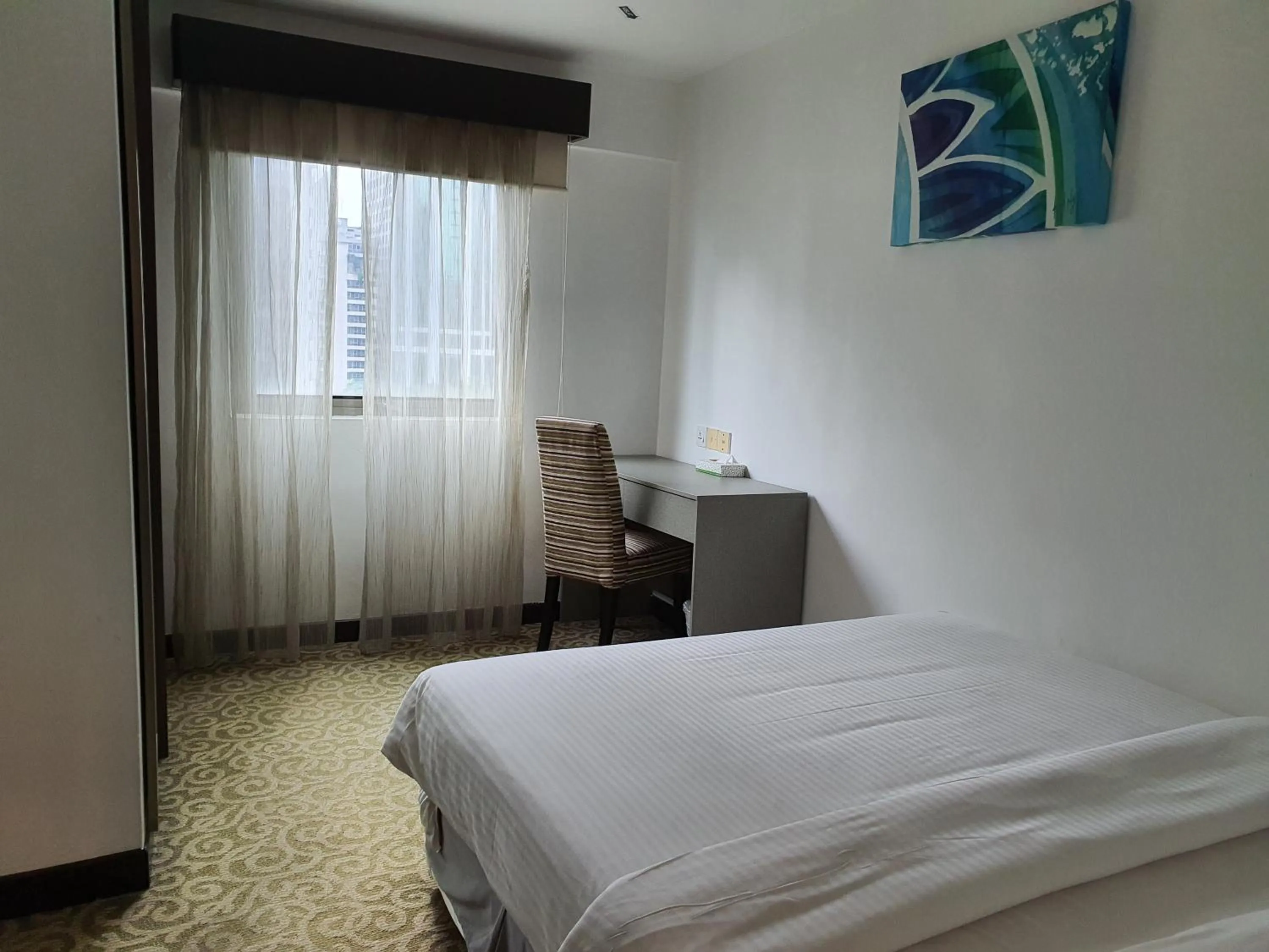 Bed in Crown Regency Serviced Suites