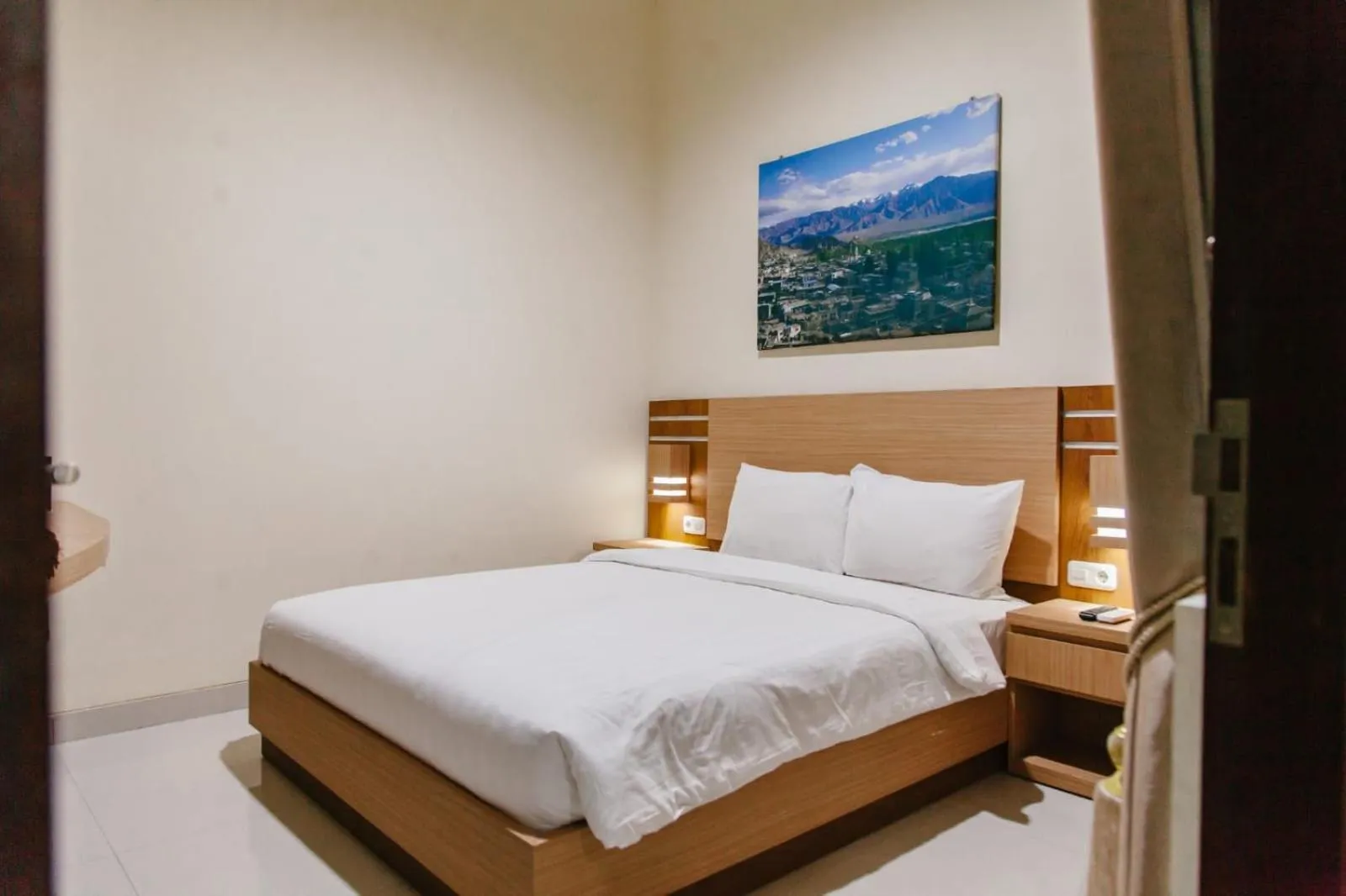 Bed in Musafir Guest House Syariah