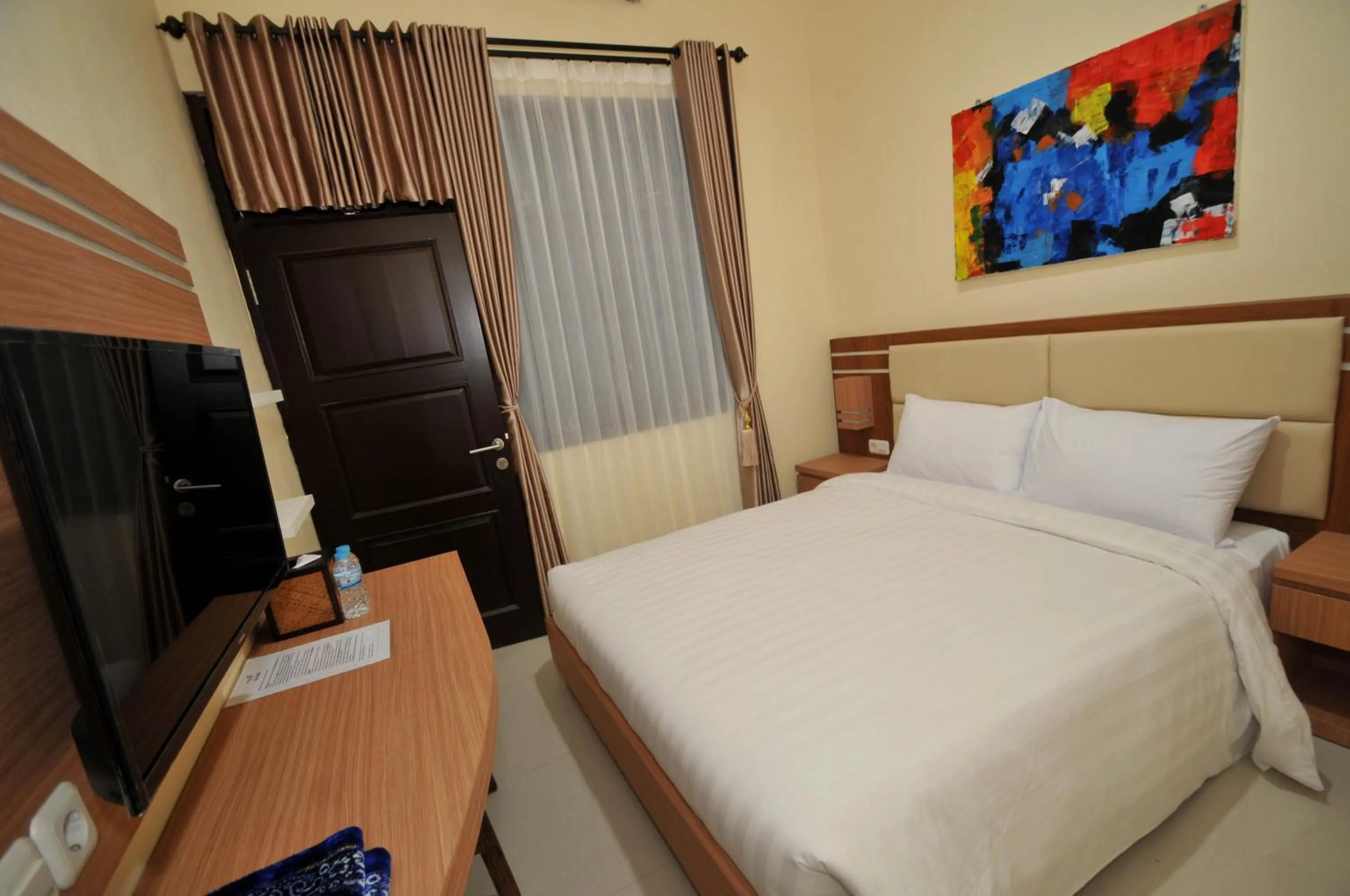 Bed in Musafir Guest House Syariah