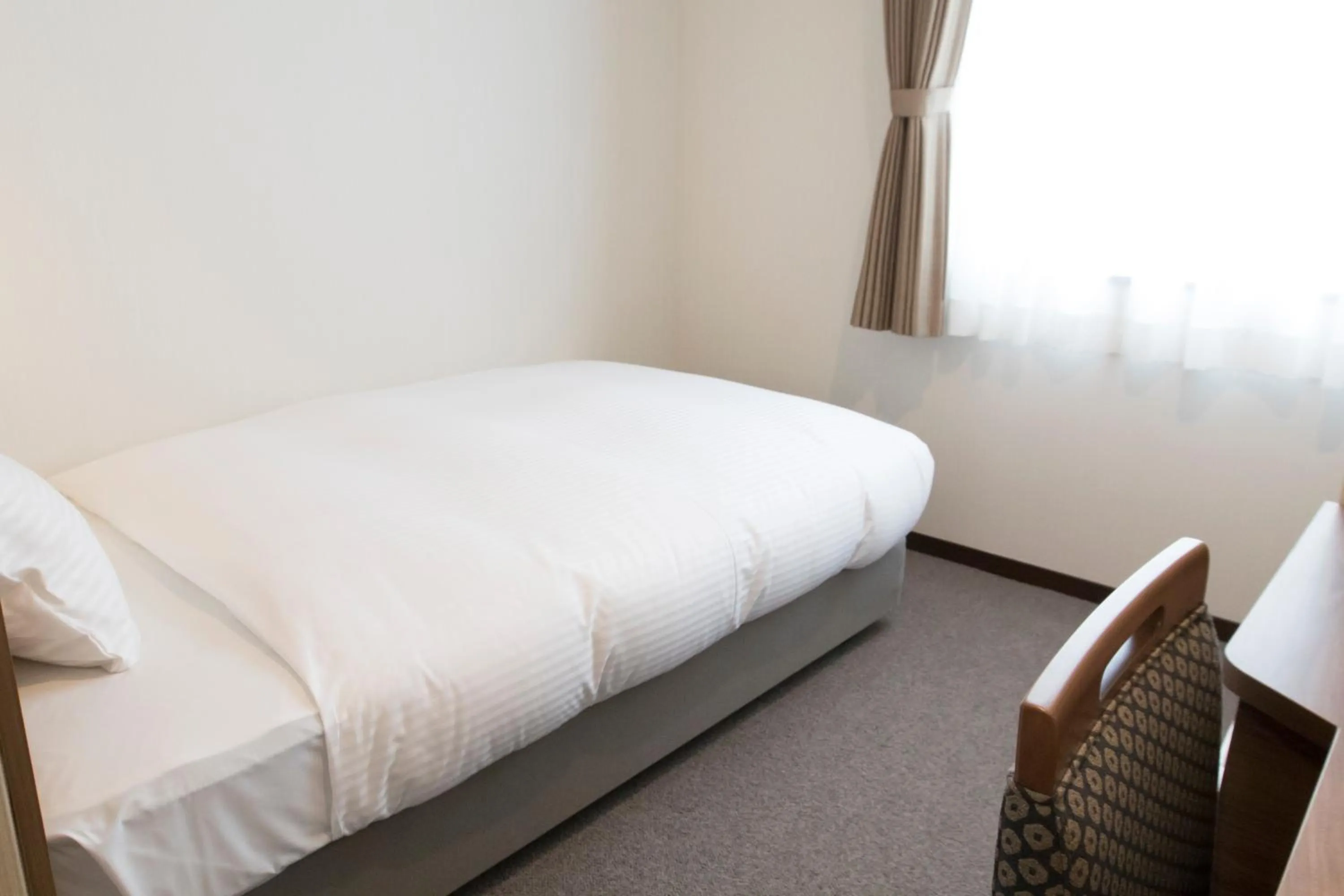 Bed in Toho Hotel Namba Motomachi