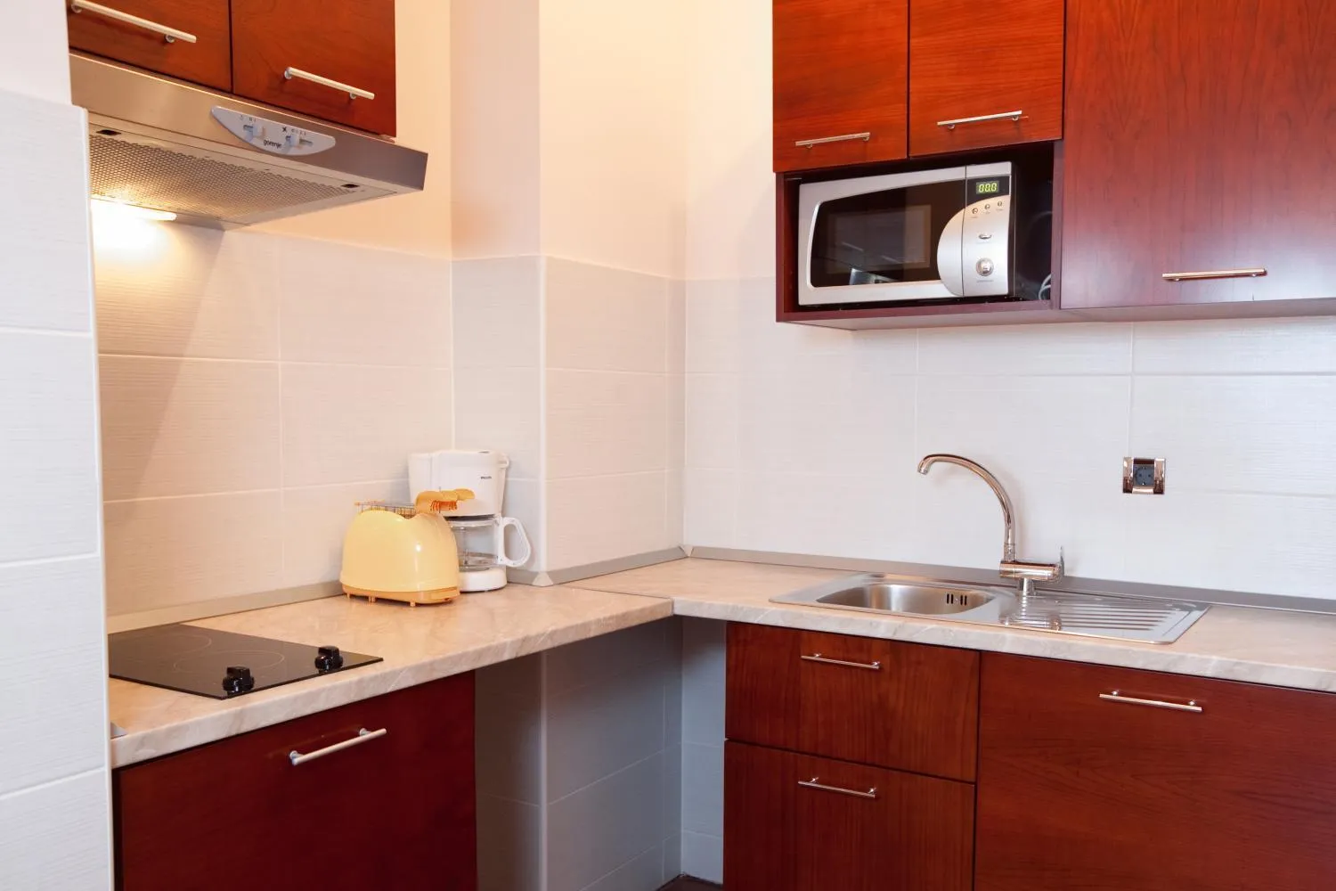 Kitchen or kitchenette in Apartments Agava