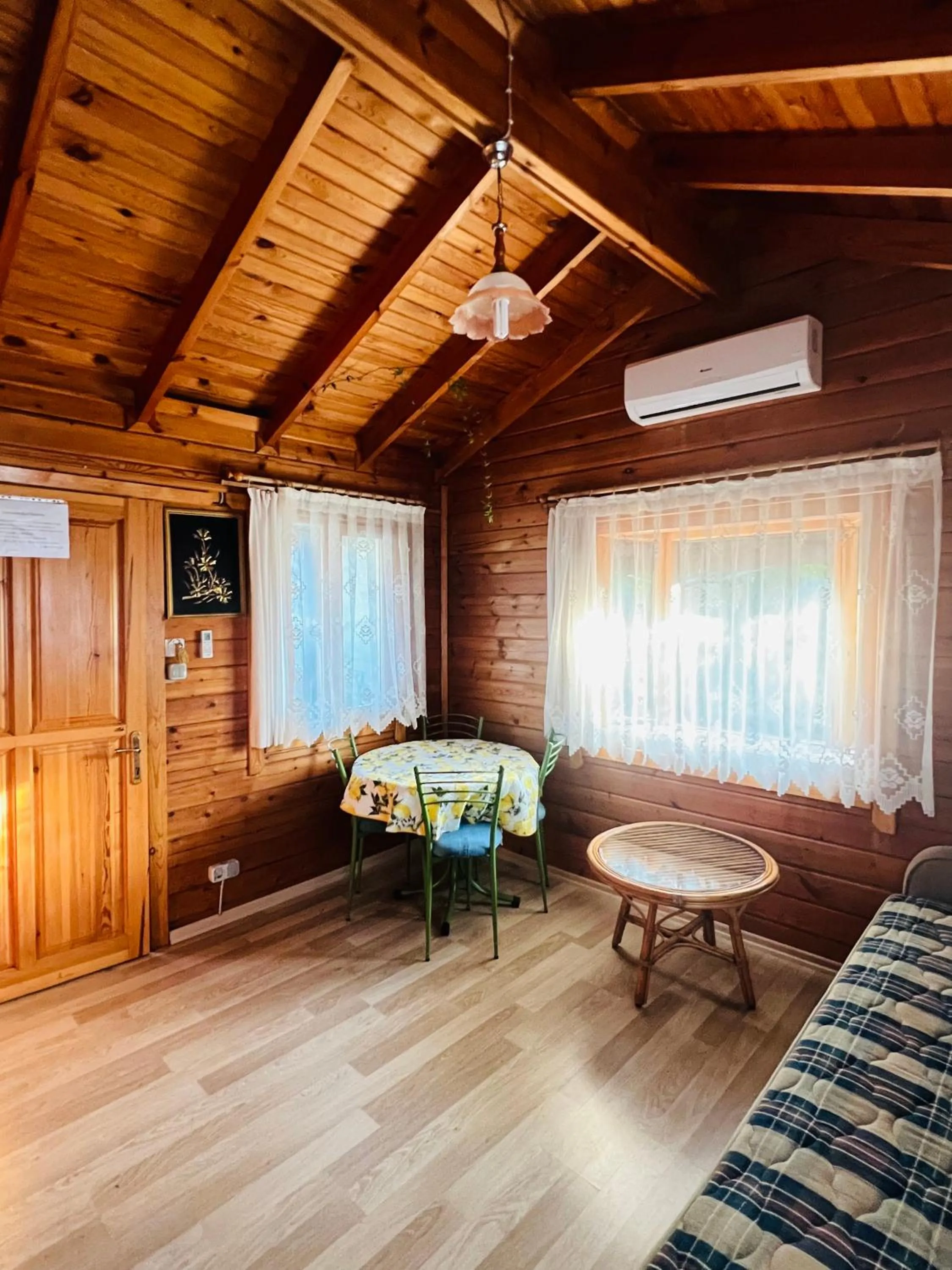 Seating area, Bed in Turkuaz Bungalows