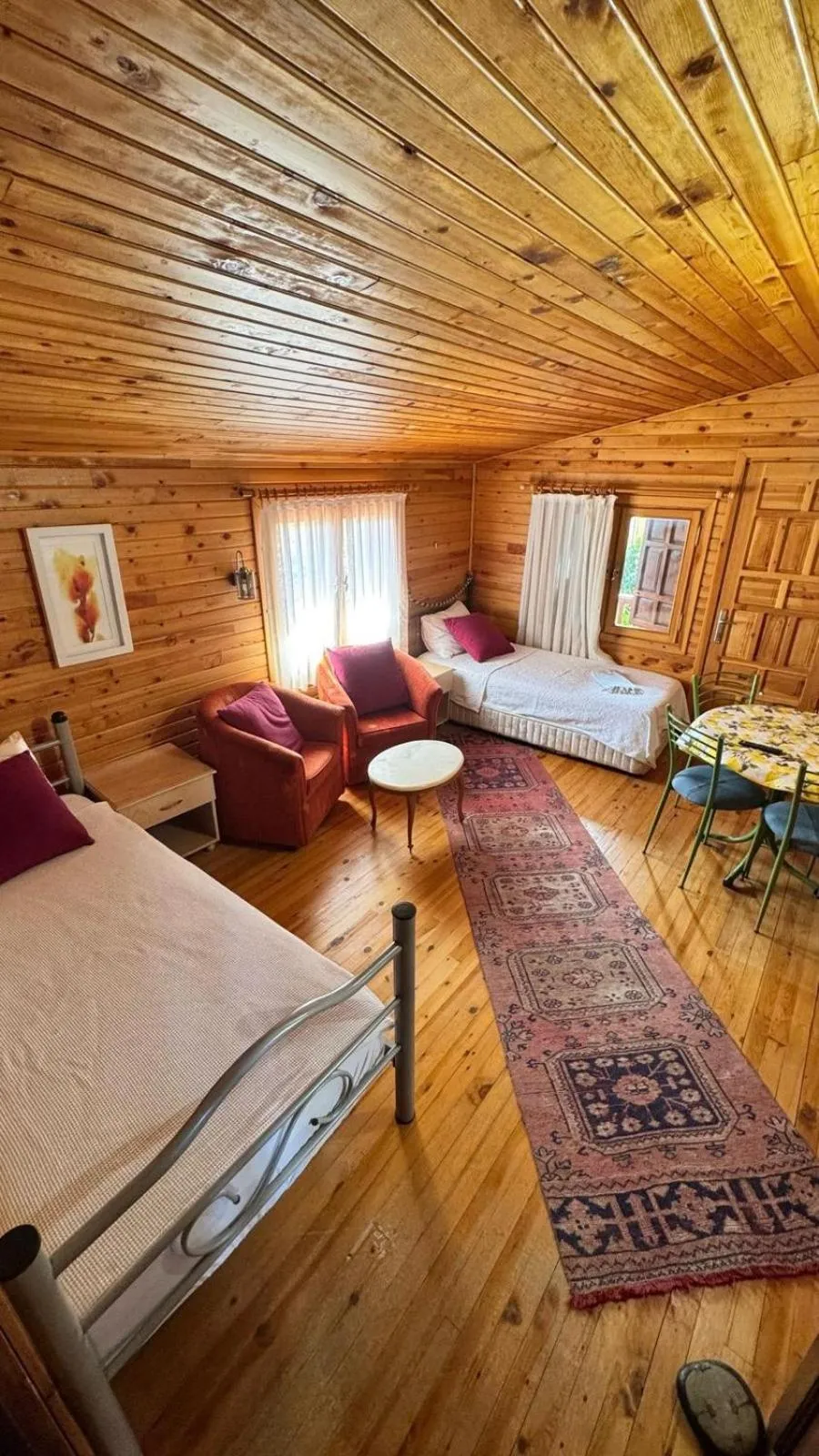 Seating area, Bed in Turkuaz Bungalows