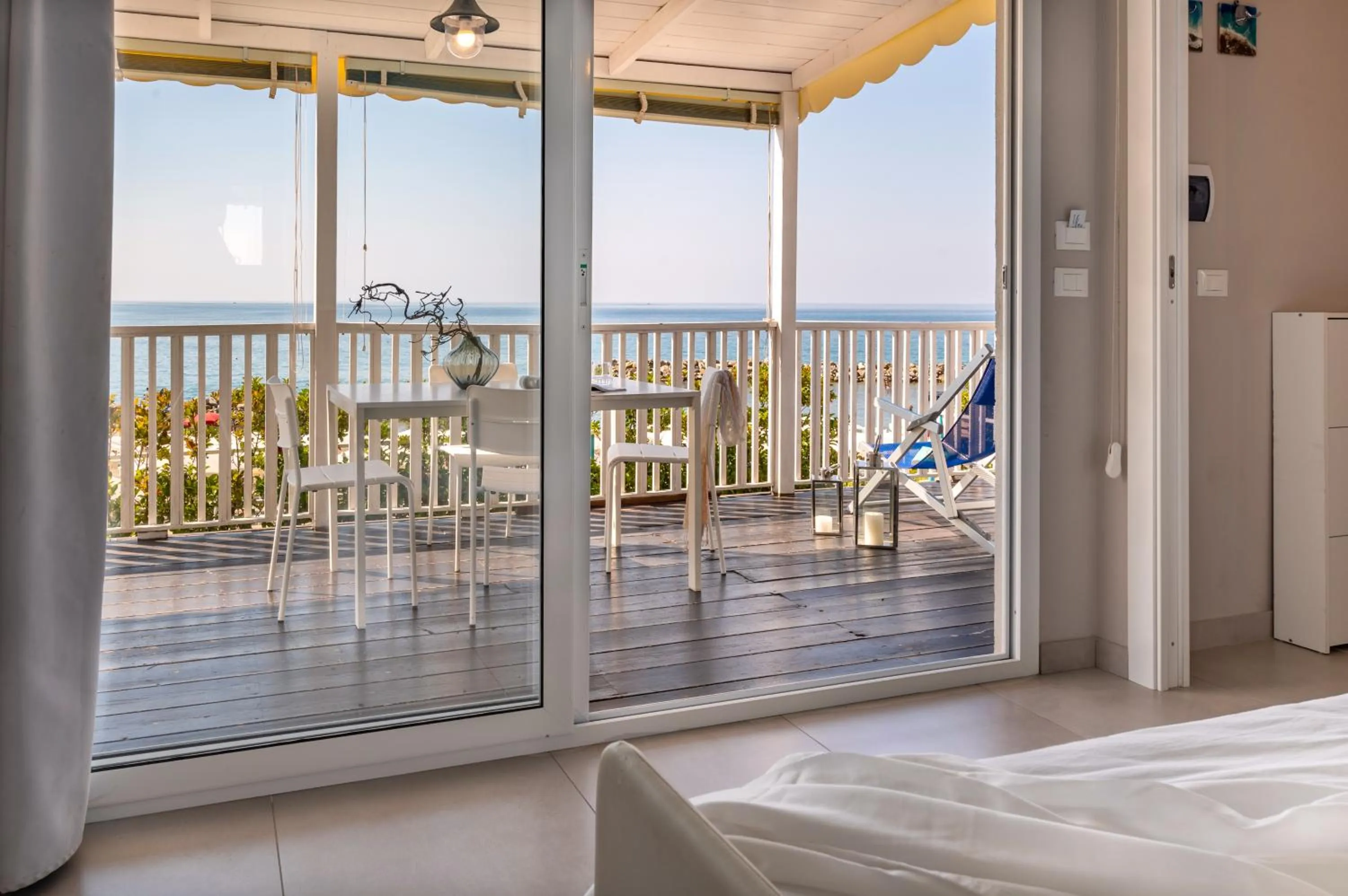 Patio, Bed in Resort Baia del Silenzio