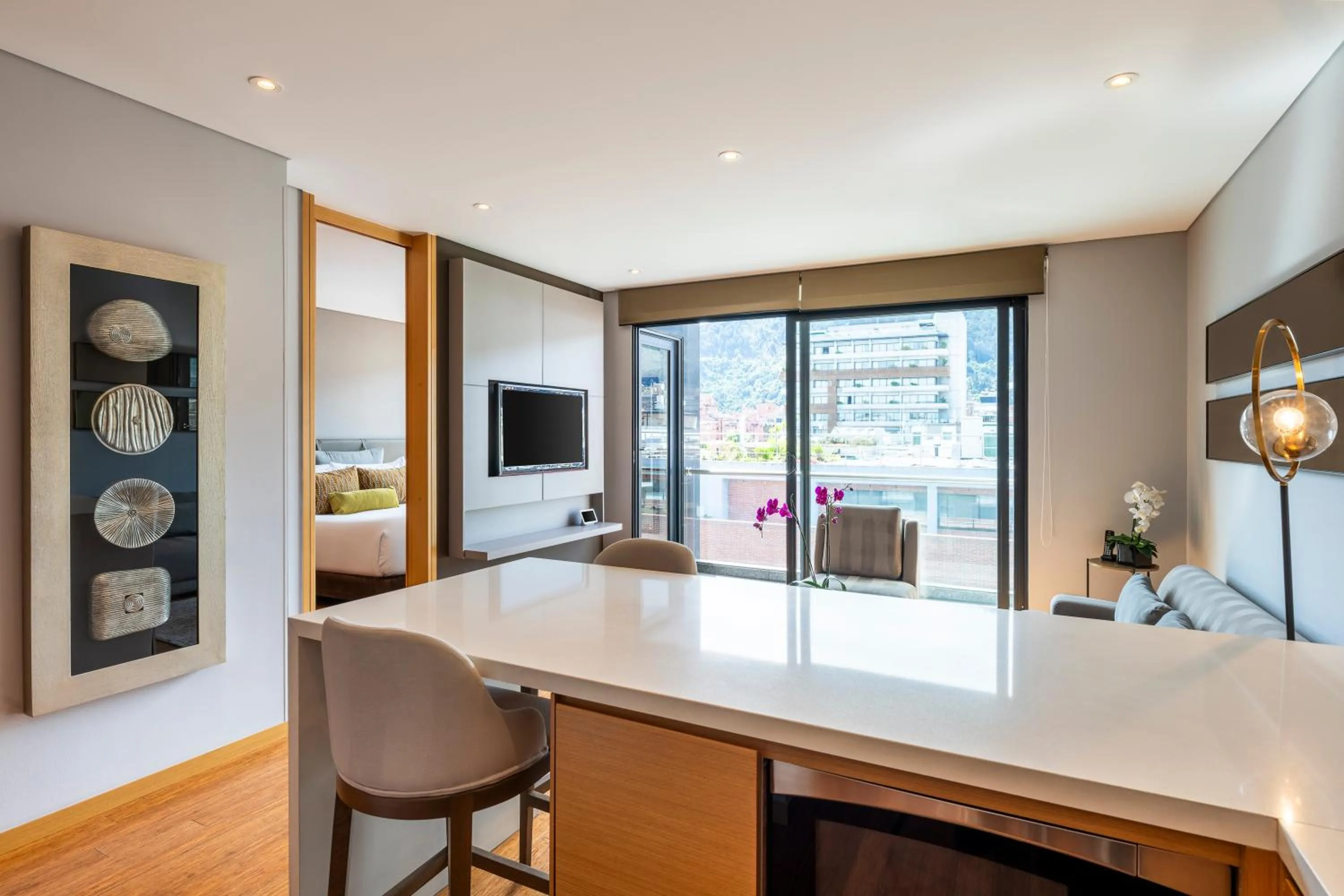 Communal lounge/ TV room in Hotel 93 Luxury Suites by Preferred