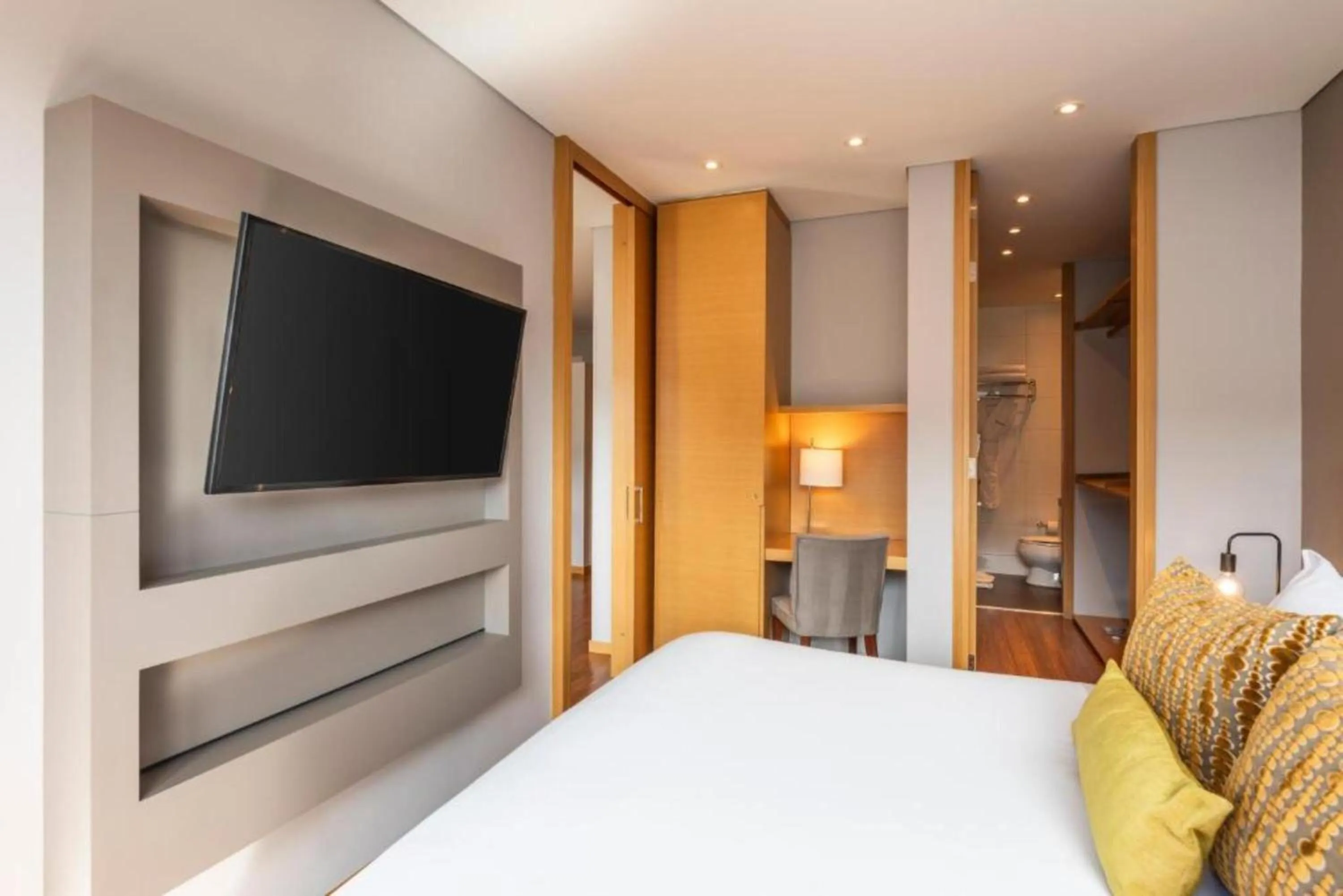 Bed in Hotel 93 Luxury Suites by Preferred