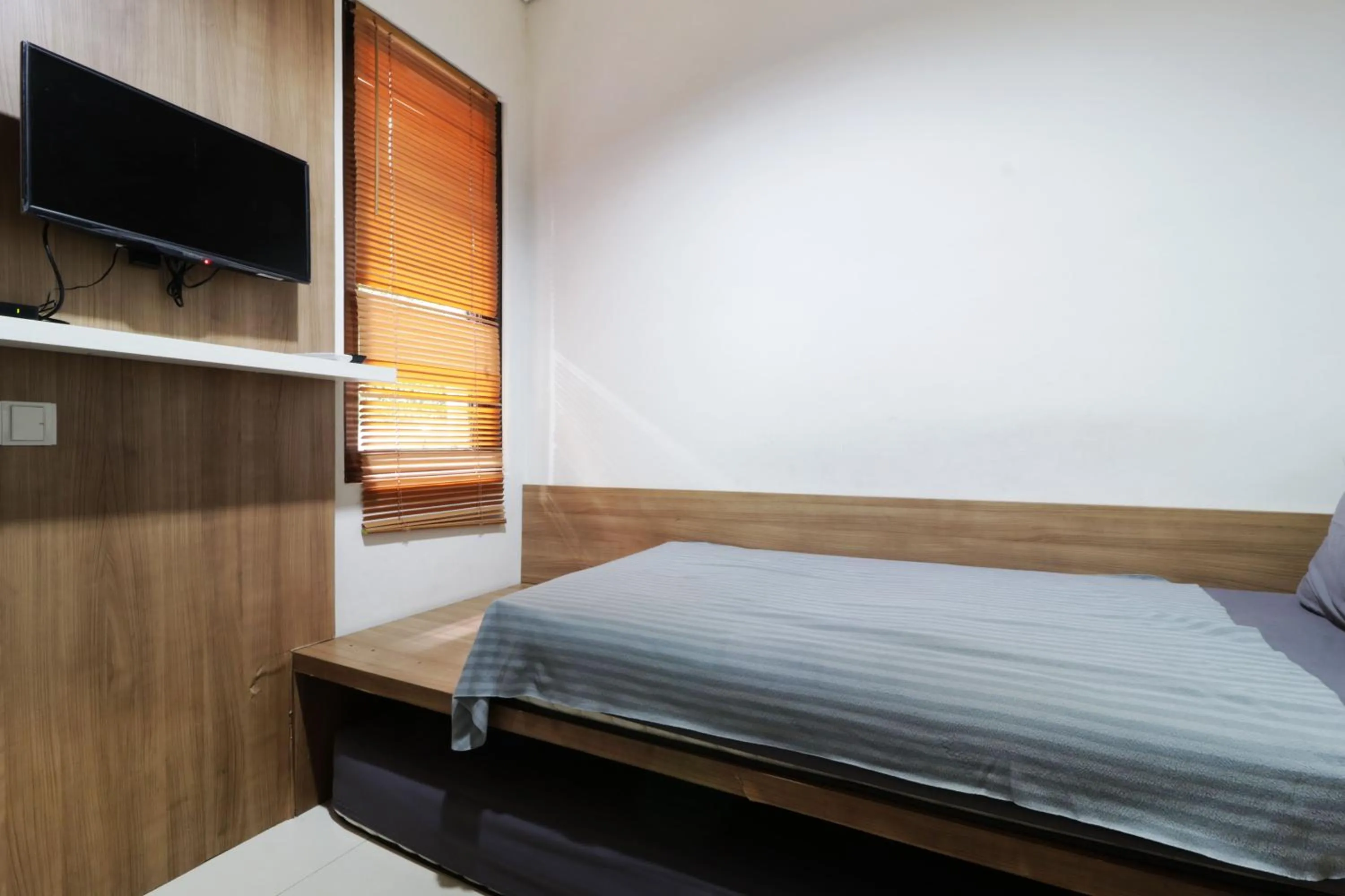 Bed in Oliver's Guest House