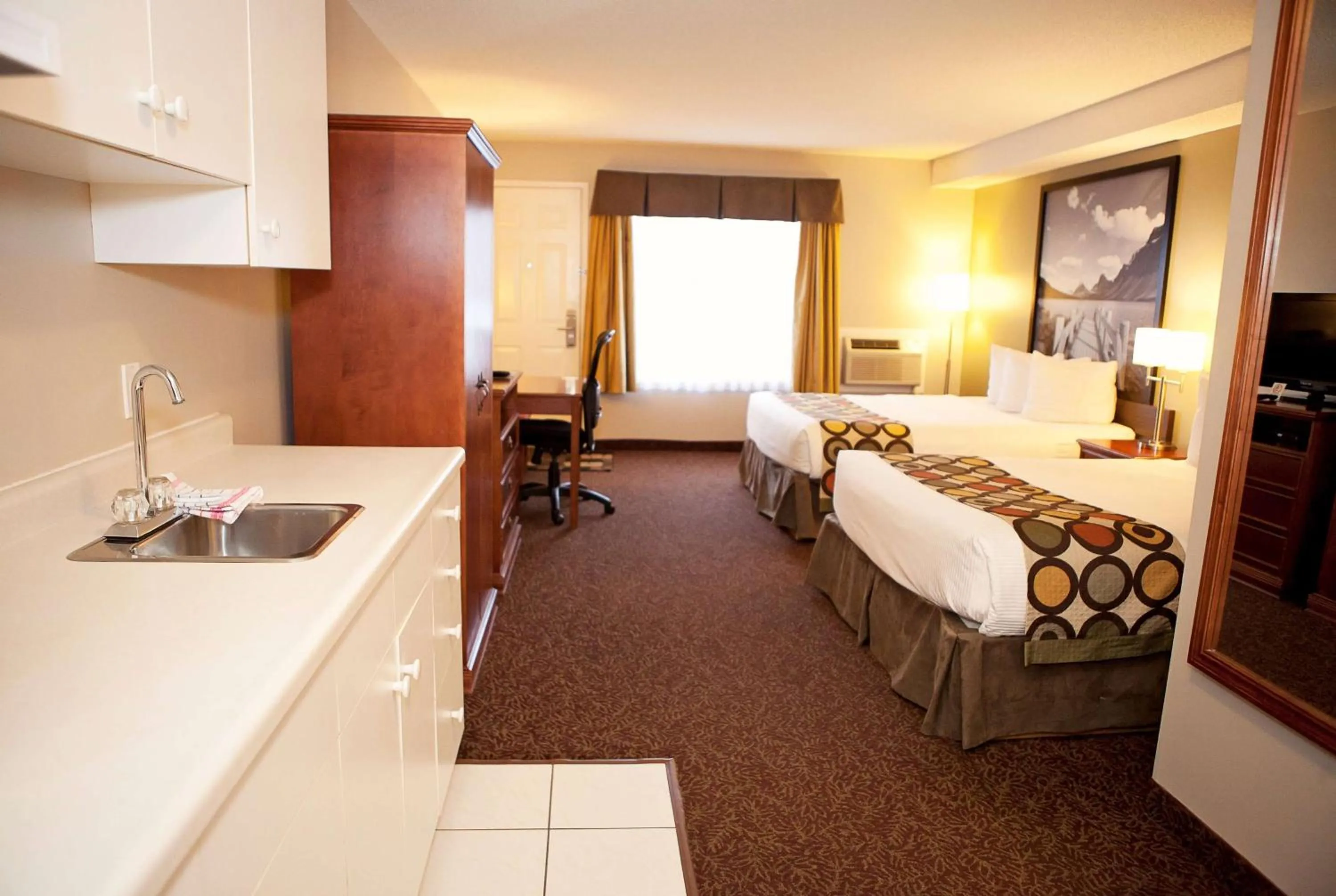 Bed in Super 8 by Wyndham Cochrane