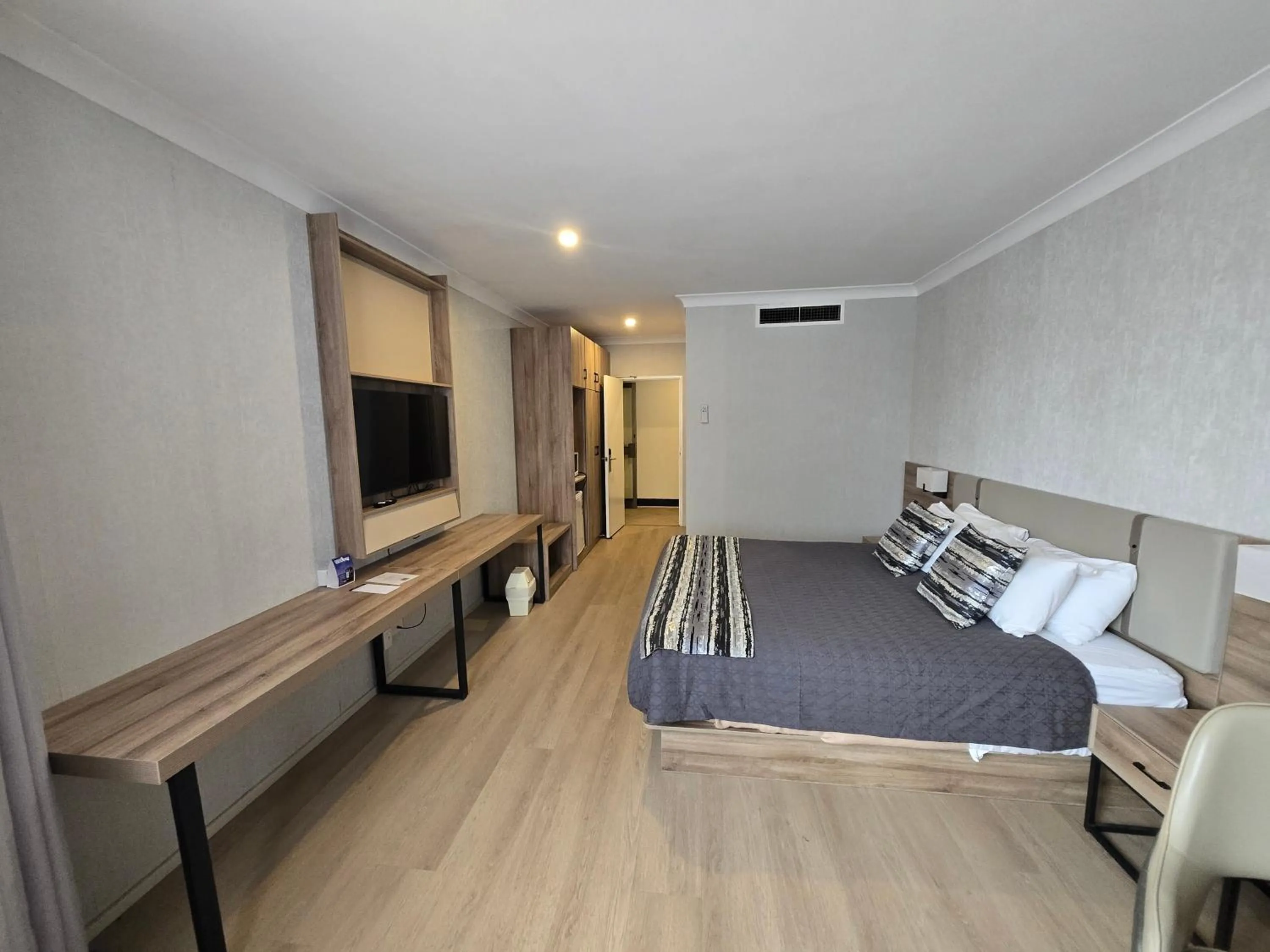 Bed in Charbonnier Motor Inn