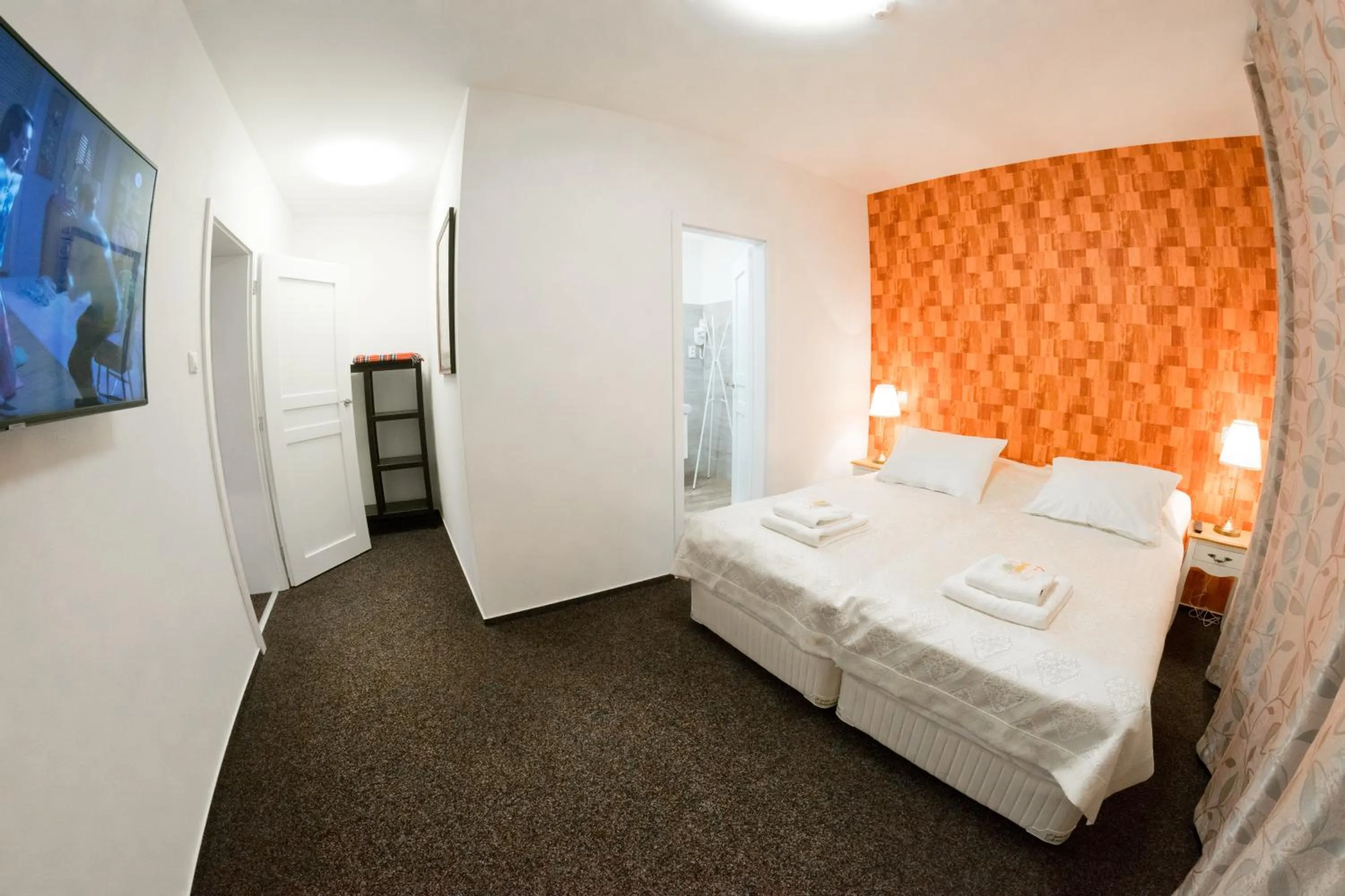 Bed in VILLA CENTRUM APARTMÁNY s RAŇAJKAMI A SAUNOU