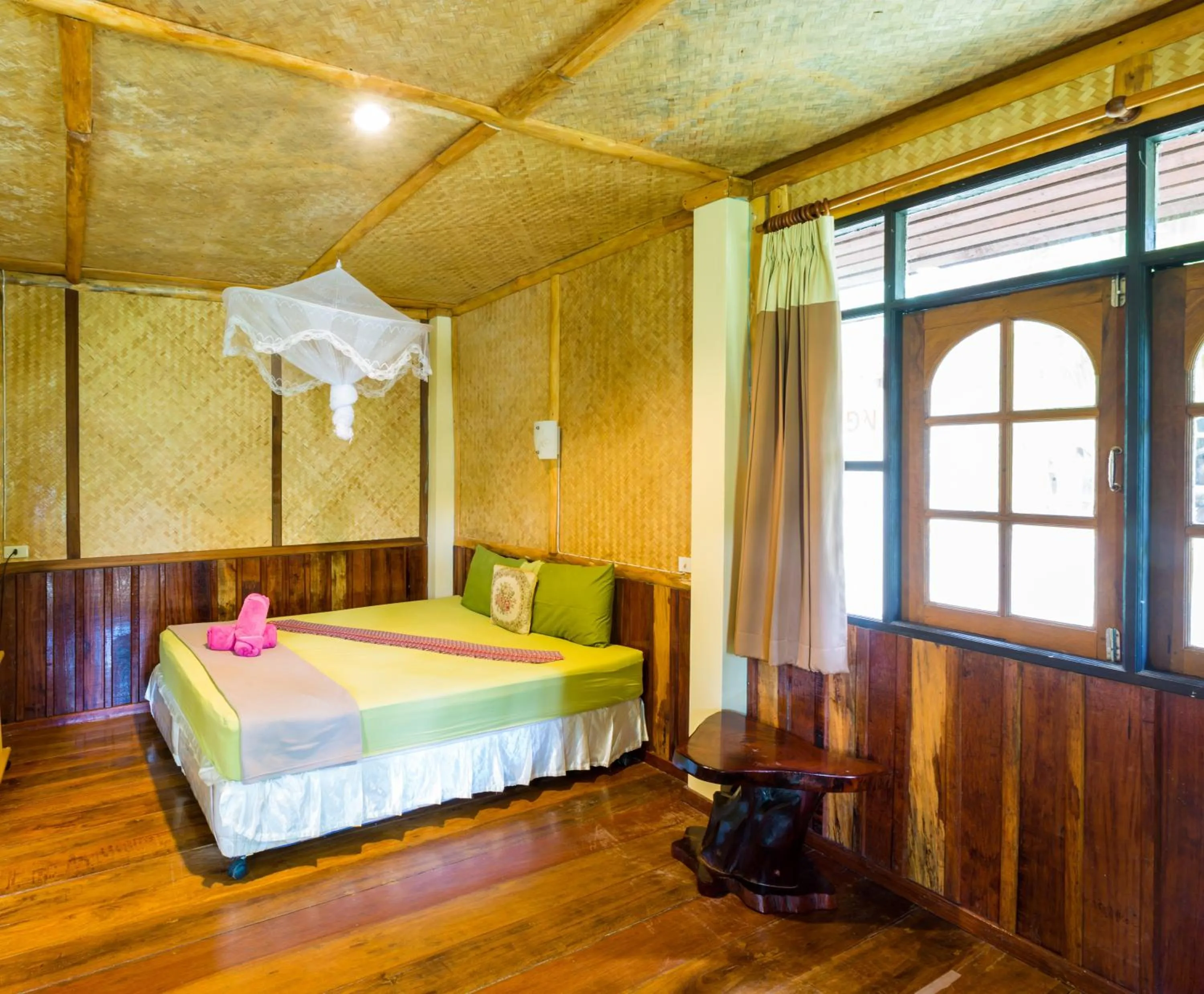 Bed in Bottle Beach 1 Resort