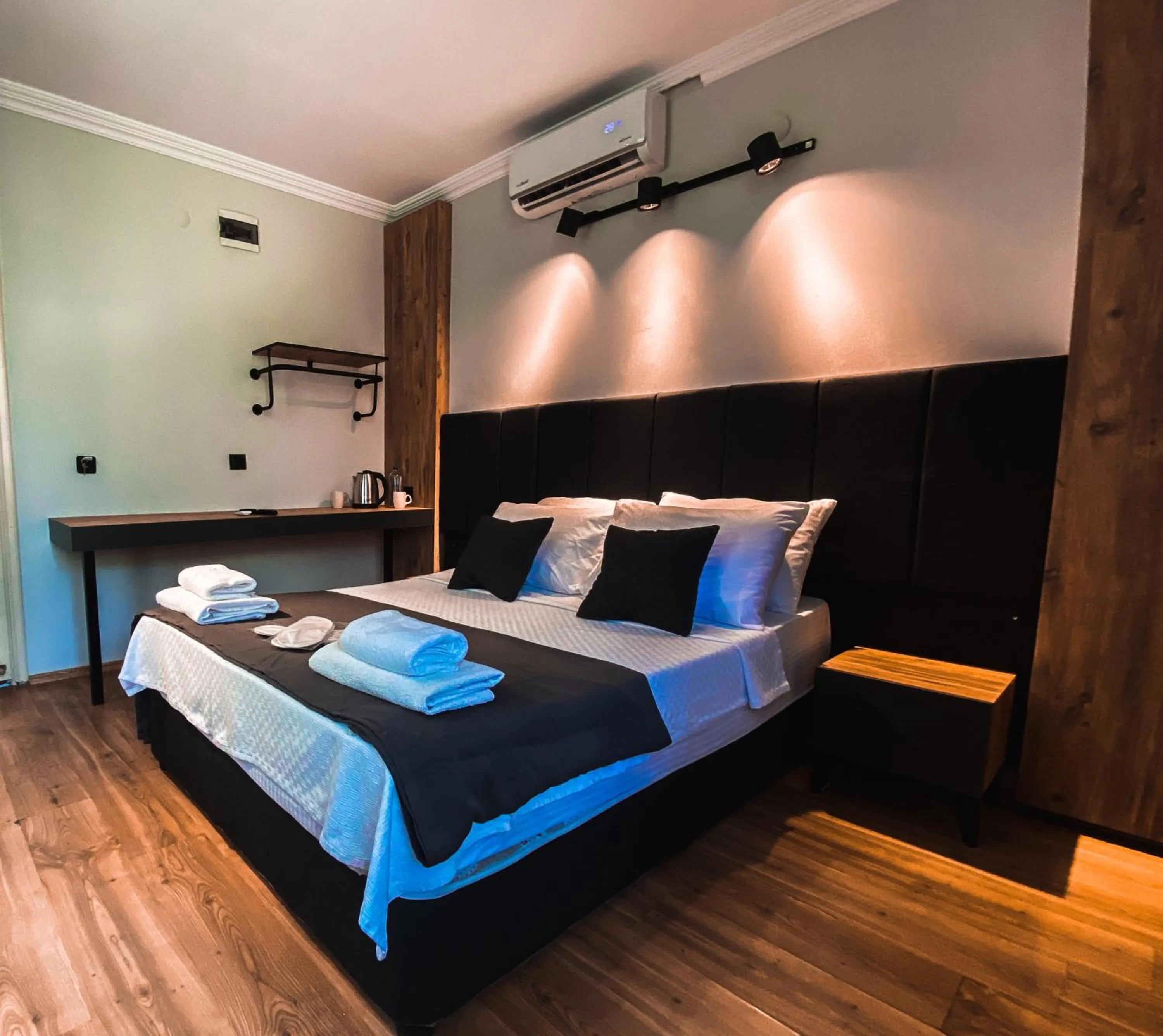 Bed in TEPE HOTEL&BUSINESS SUITE