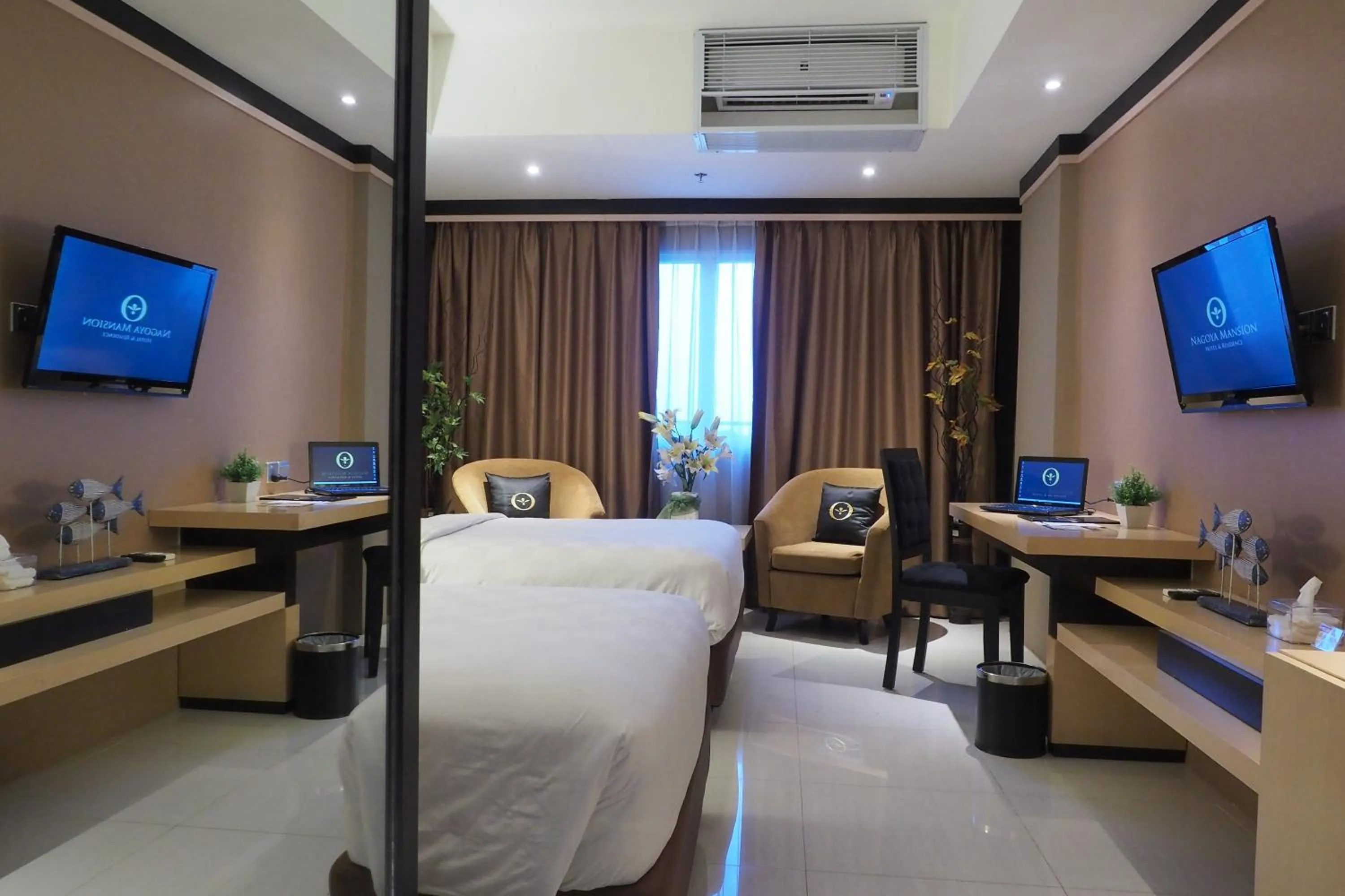 TV and multimedia in Nagoya Mansion Hotel and Residence