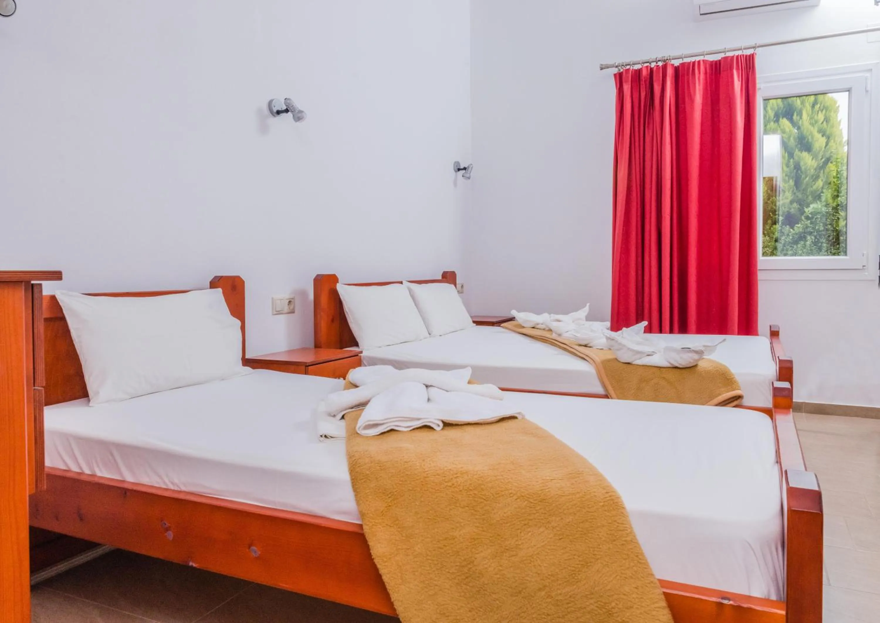 Bed in Arsinoi Studios and Apartments