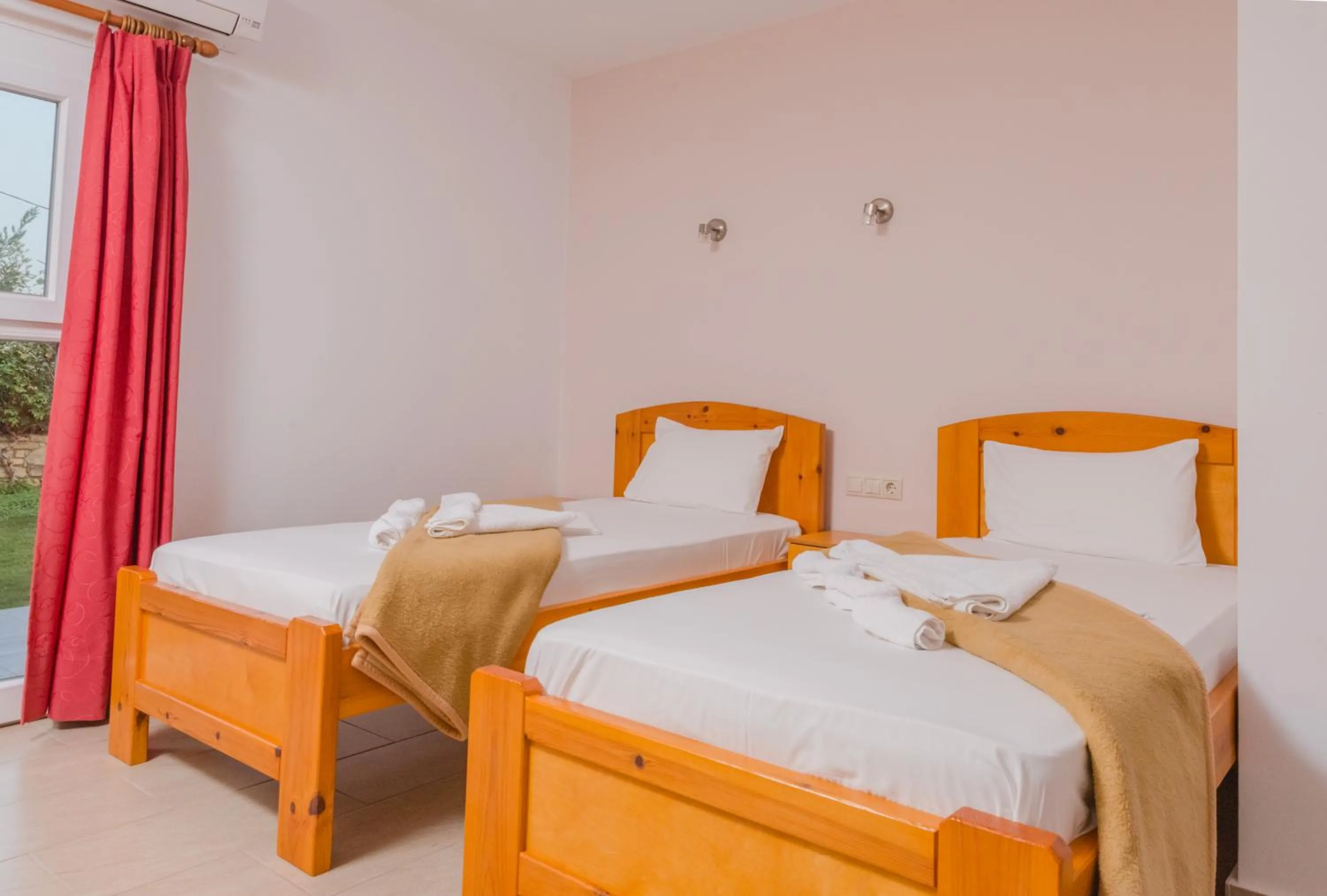 Bed in Arsinoi Studios and Apartments